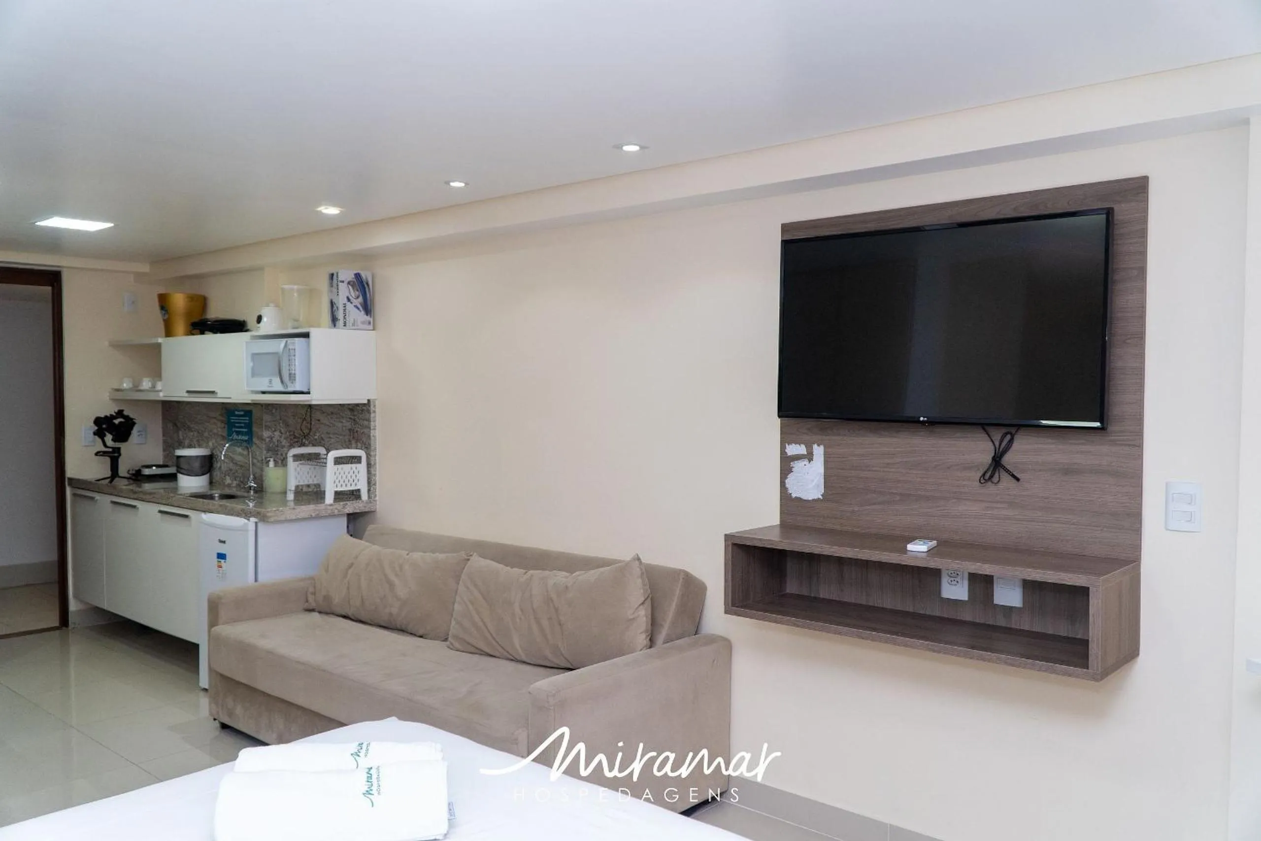 Living room in Gold Flat - Miramar Hospedagens