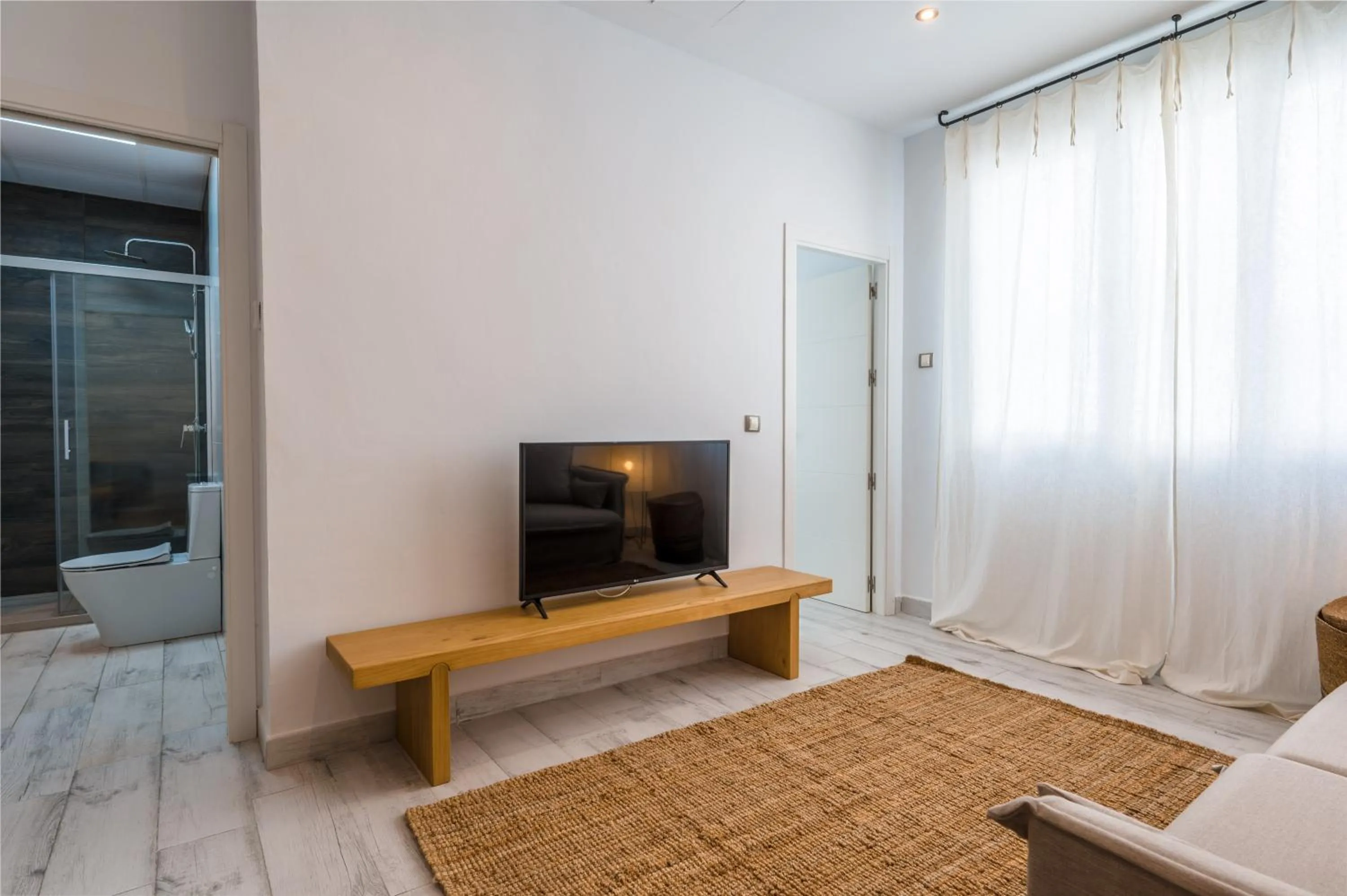 TV and multimedia in Apartamentos "El Escondite de Triana"