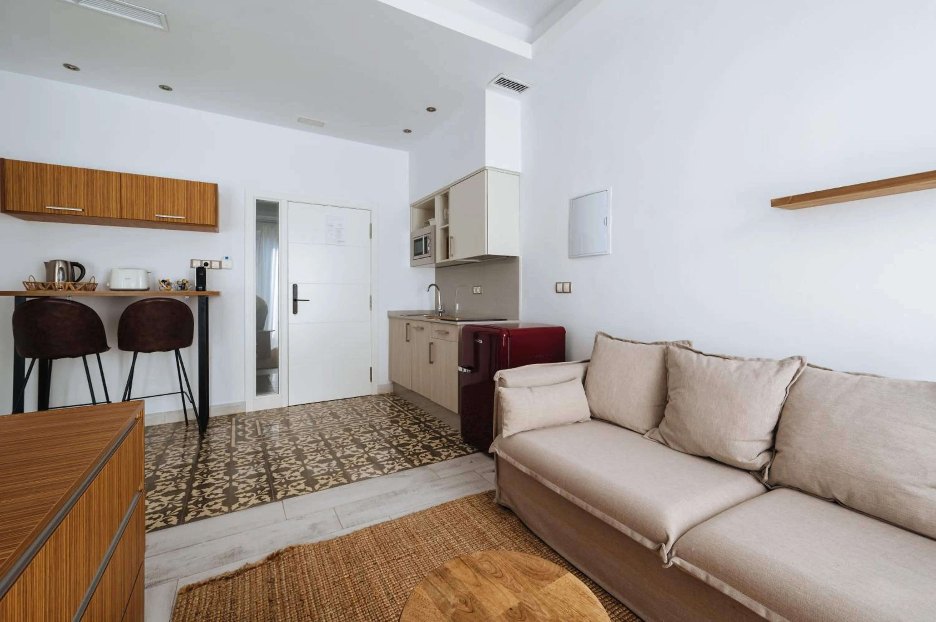 Kitchen or kitchenette in Apartamentos "El Escondite de Triana"