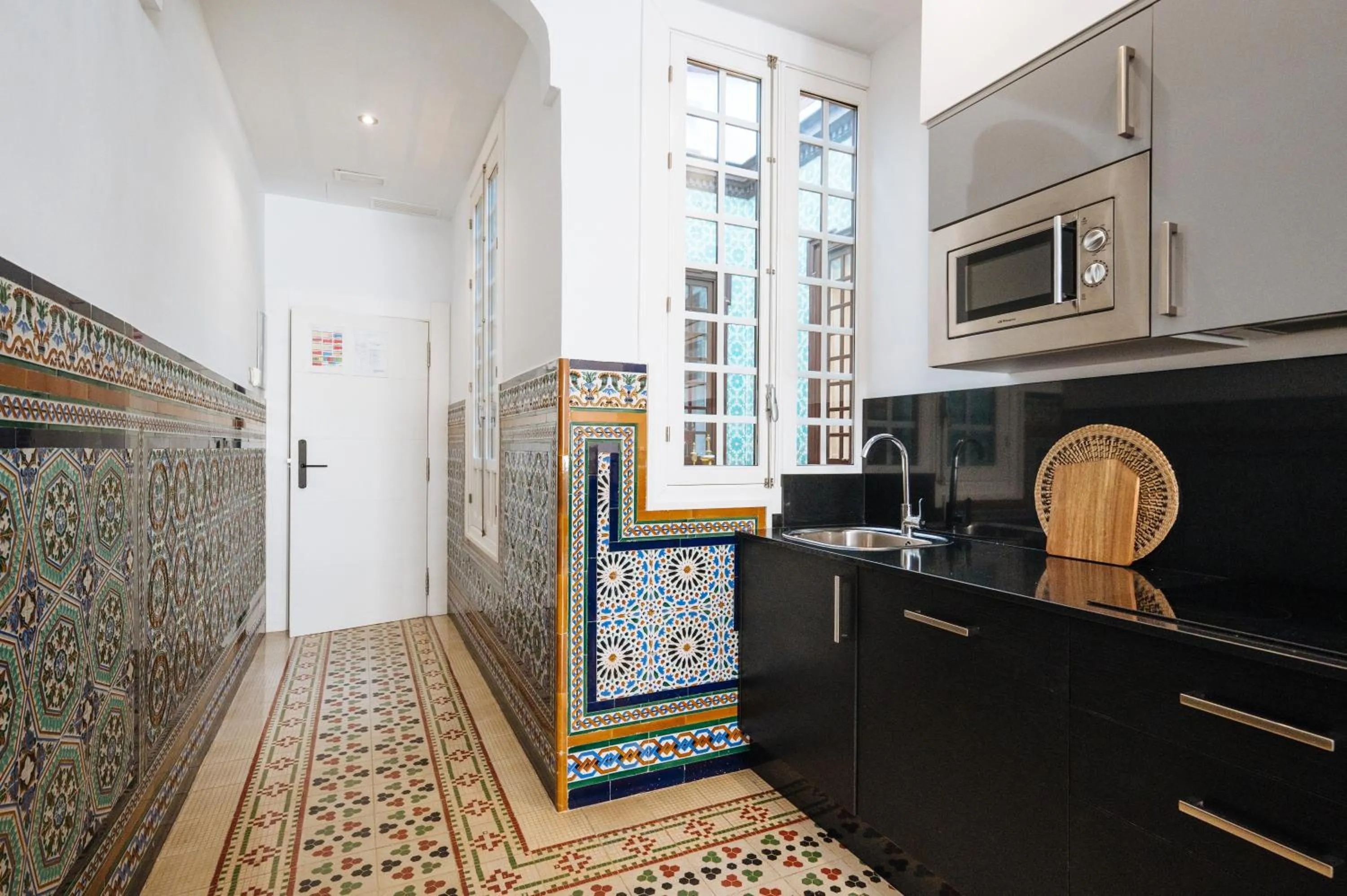 Kitchen or kitchenette in Apartamentos "El Escondite de Triana"