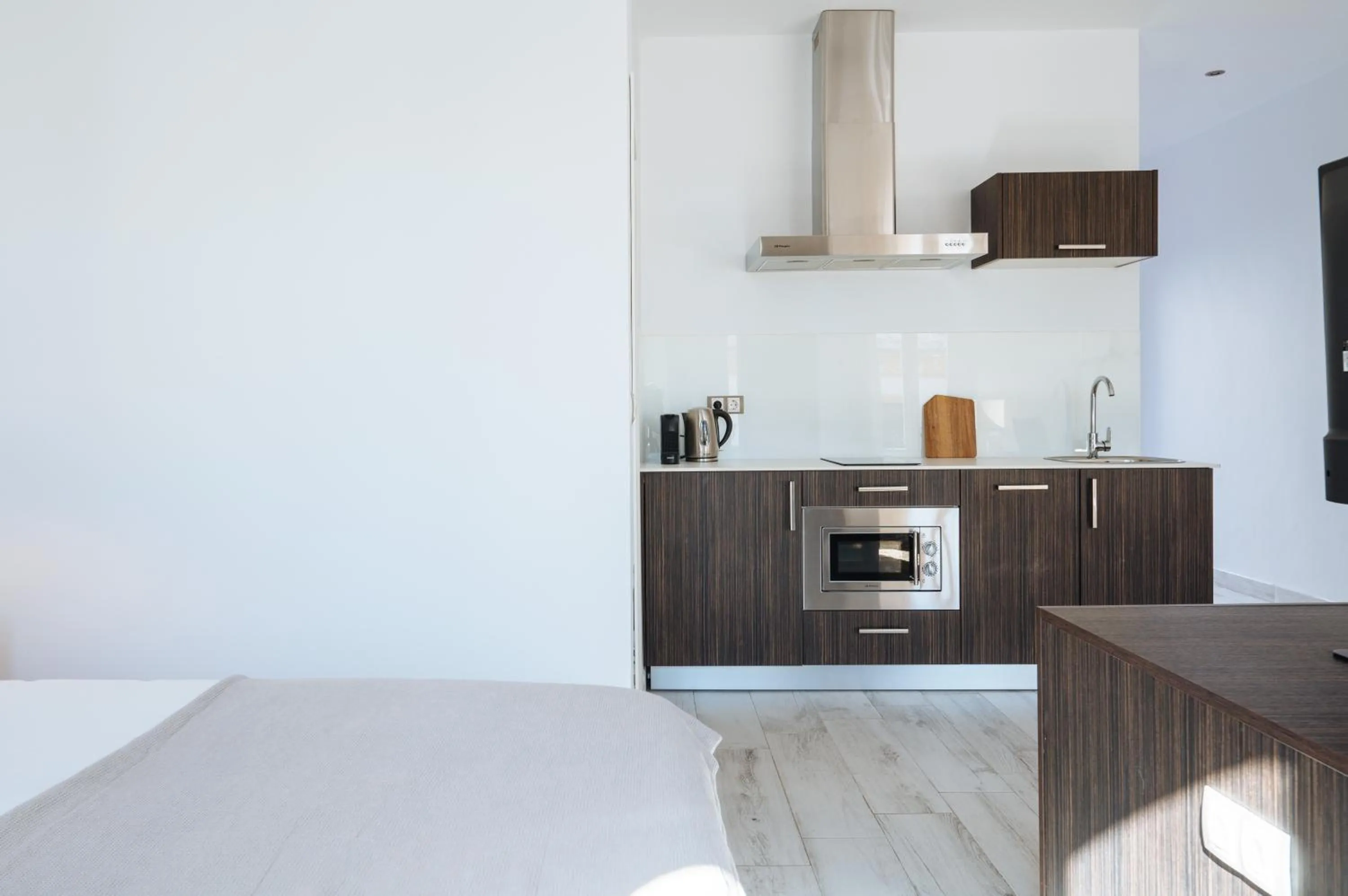 Kitchen or kitchenette in Apartamentos "El Escondite de Triana"