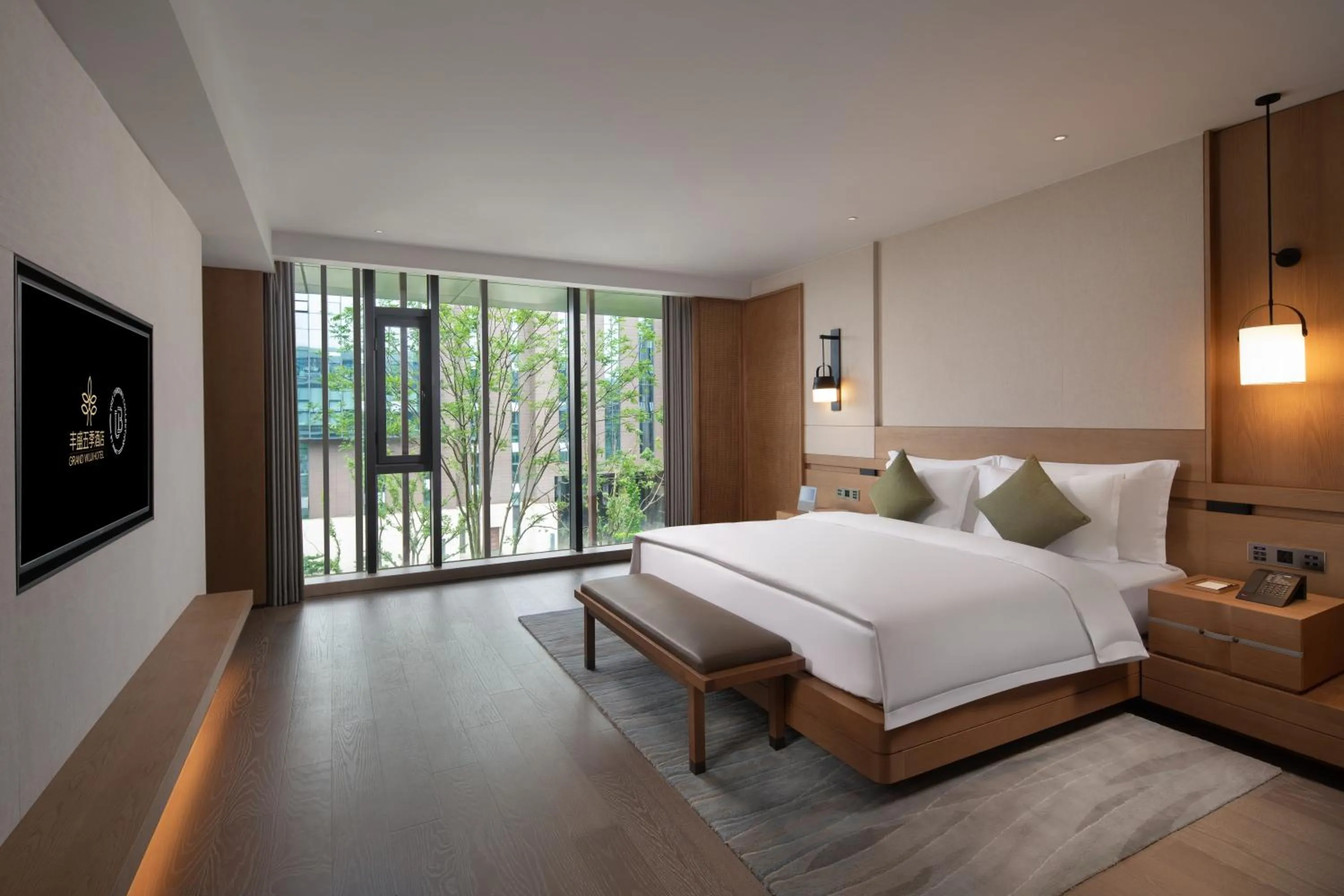 Photo of the whole room, Bed in Grand WUJI Hotel, in The Unbound Collection by Hyatt