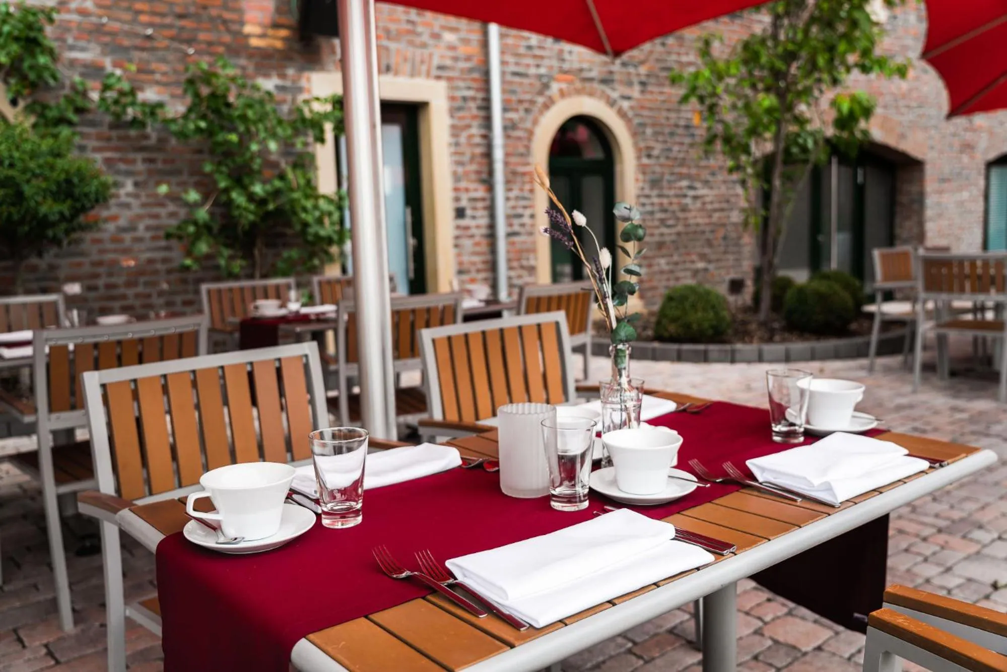 Patio in ClassicX Landhaus & Hotel - Bed & Breakfast