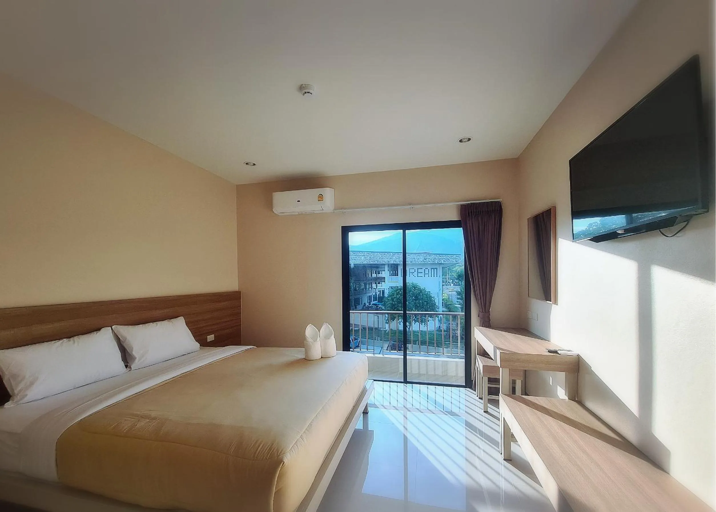 Bed in Grand Maihom Hotel