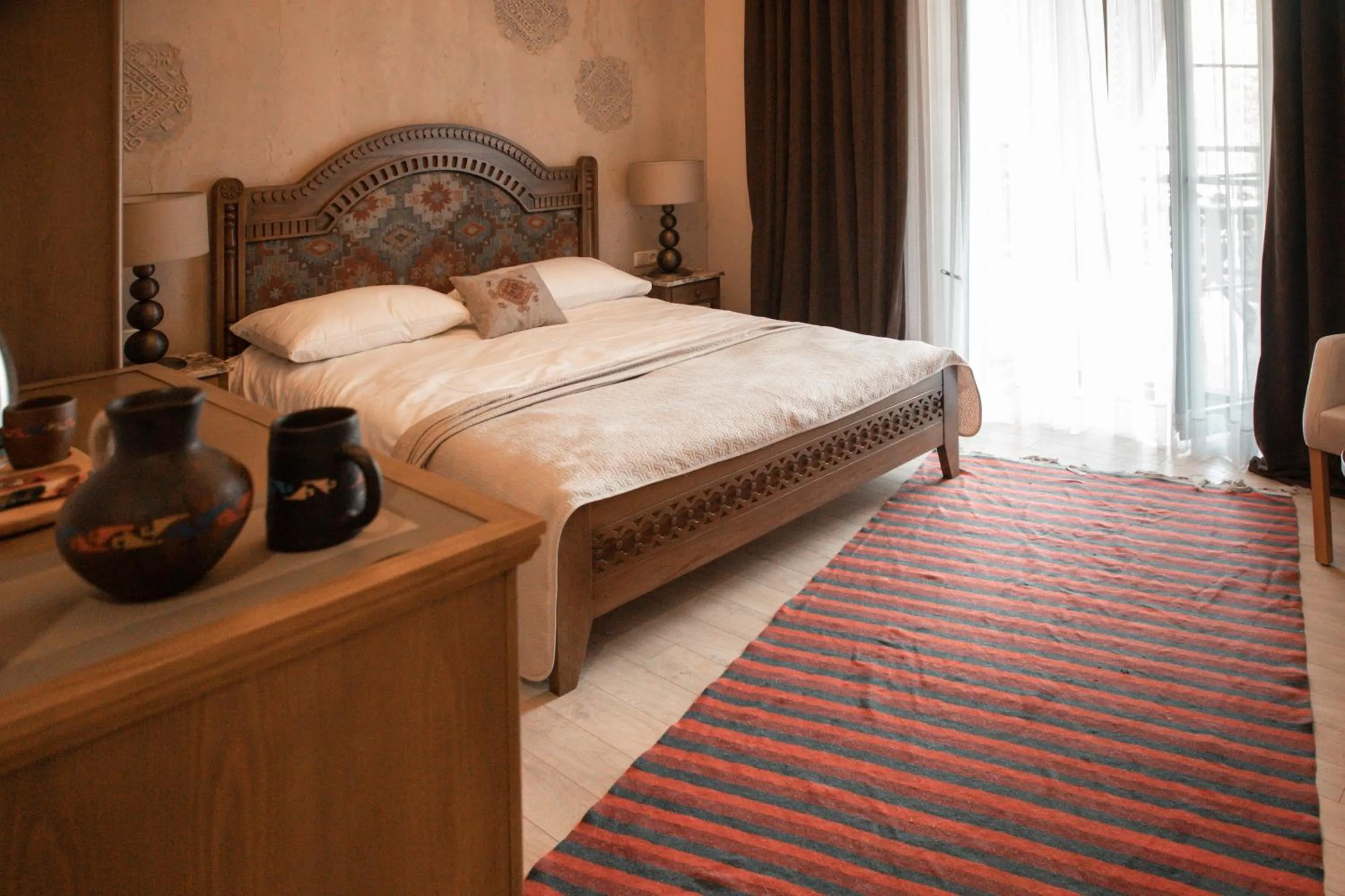 Bed in Boutique ETHNO HOTEL