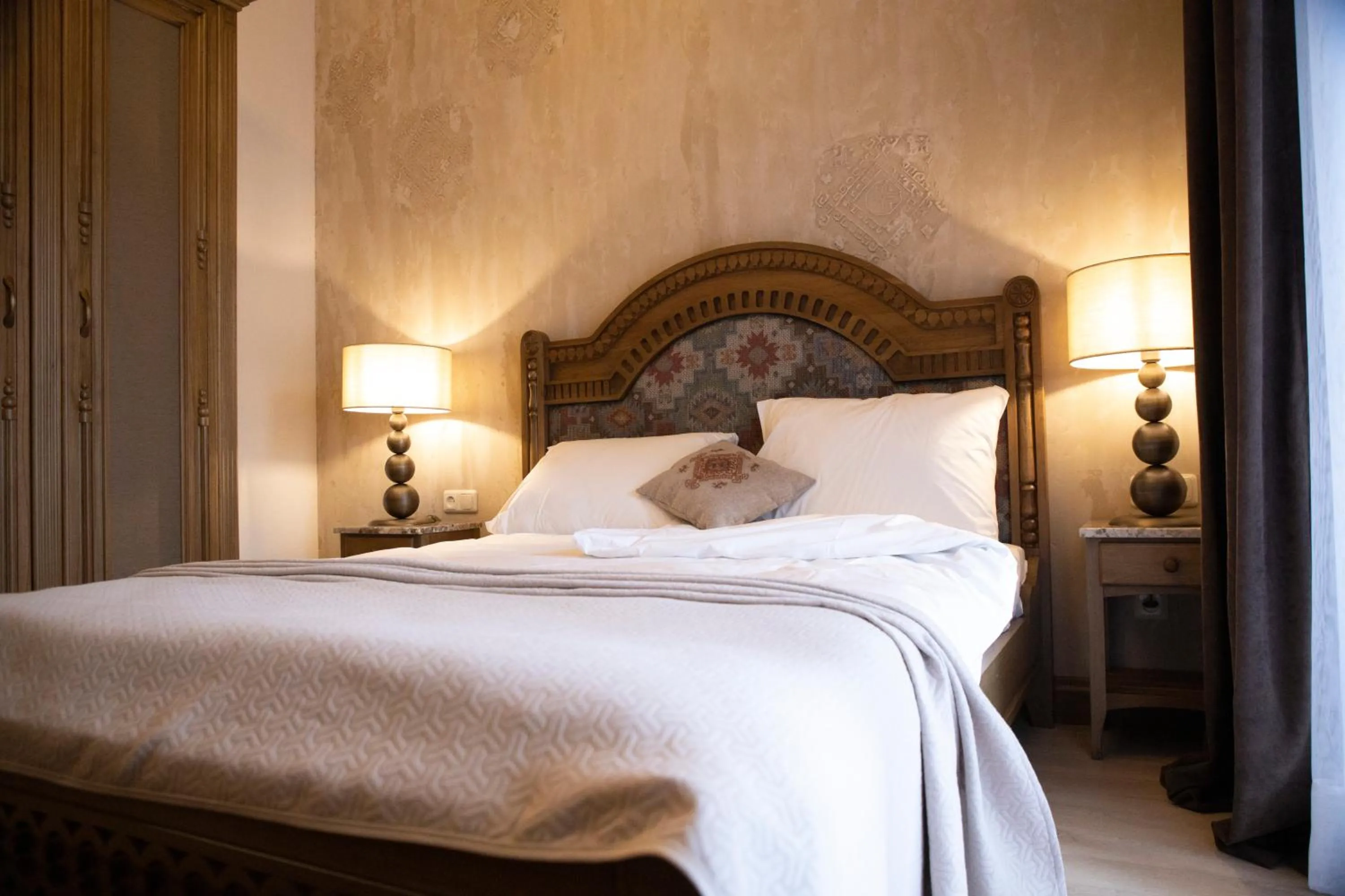 Bed in Boutique ETHNO HOTEL