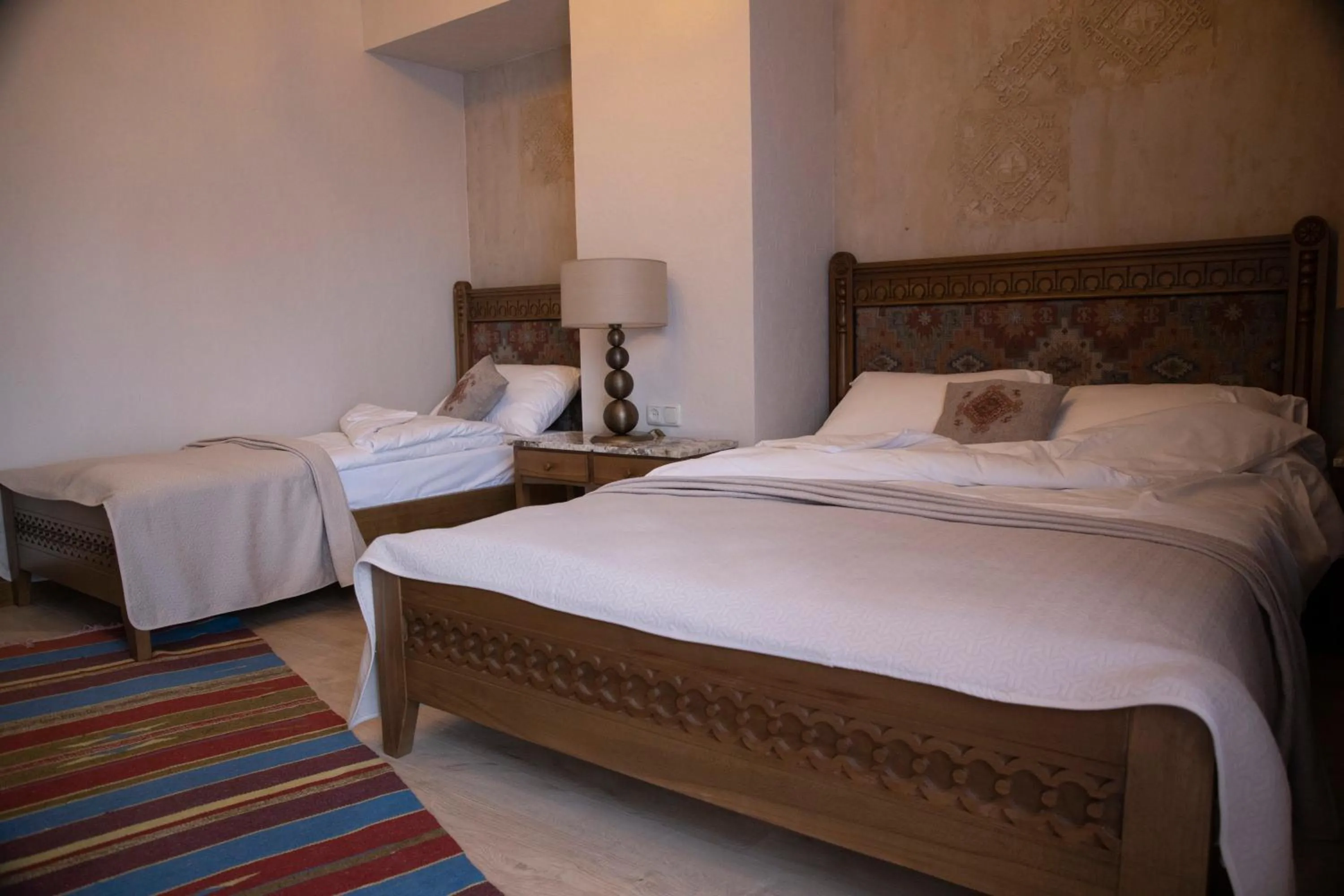 Bed in Boutique ETHNO HOTEL