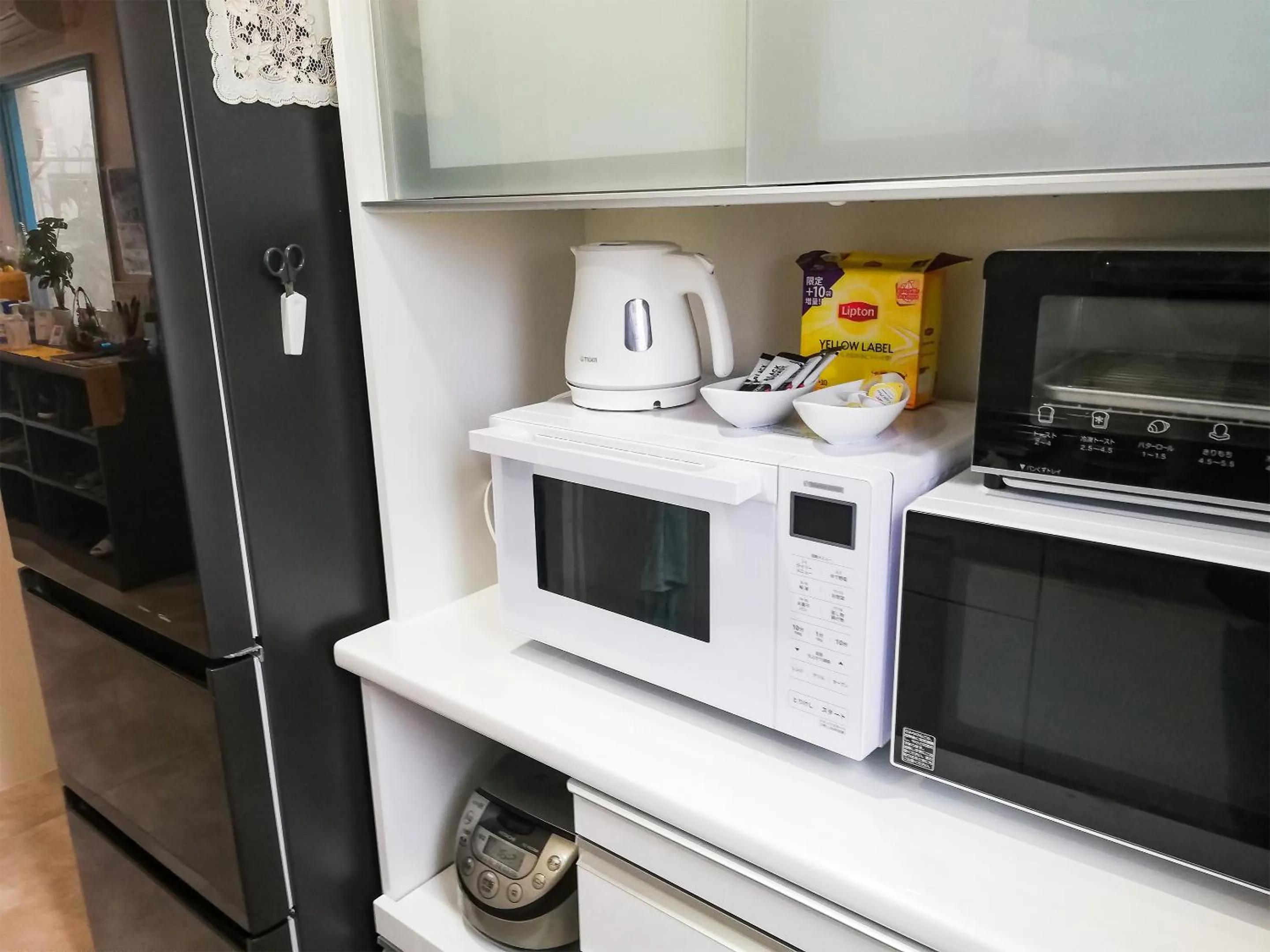 Communal kitchen in Room Biotop YOMITAN