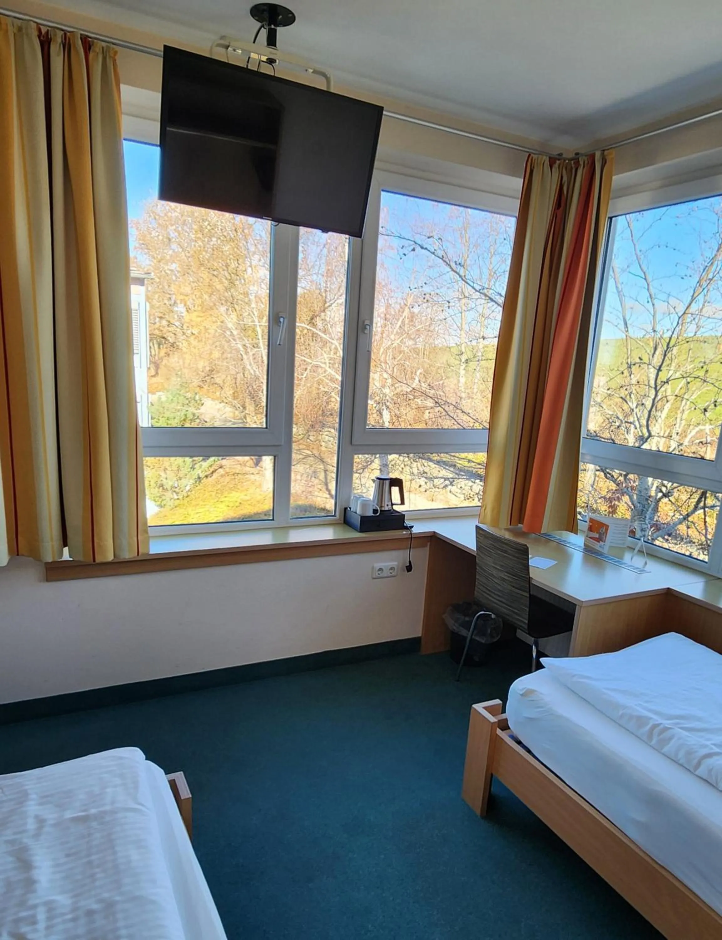 Photo of the whole room, Bed in smartMotel