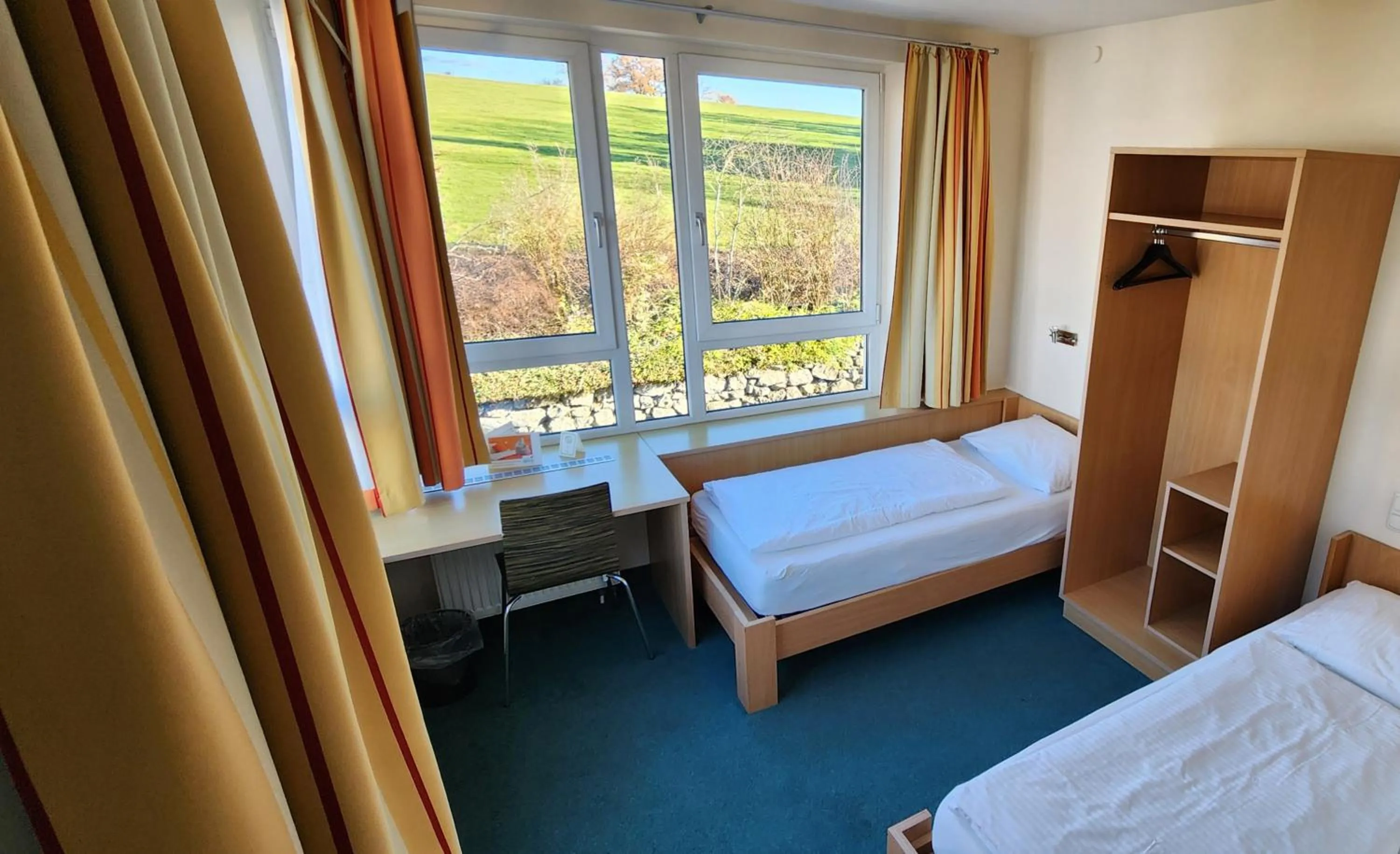 Photo of the whole room, Bed in smartMotel