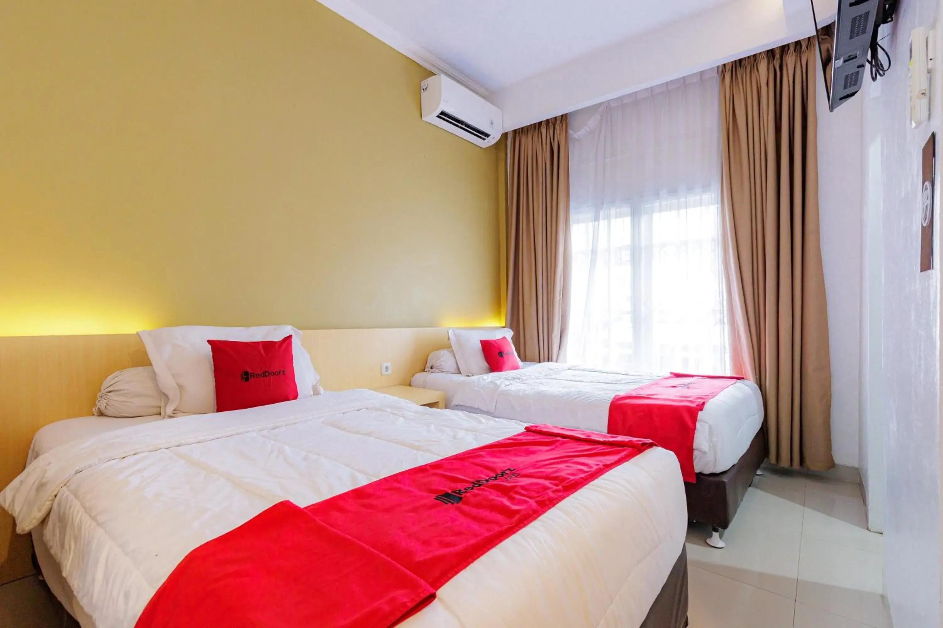 Twin Room in RedDoorz Plus Syariah near Museum Lampung Twin Room in RedDoorz Plus Syariah near Museum Lampung
