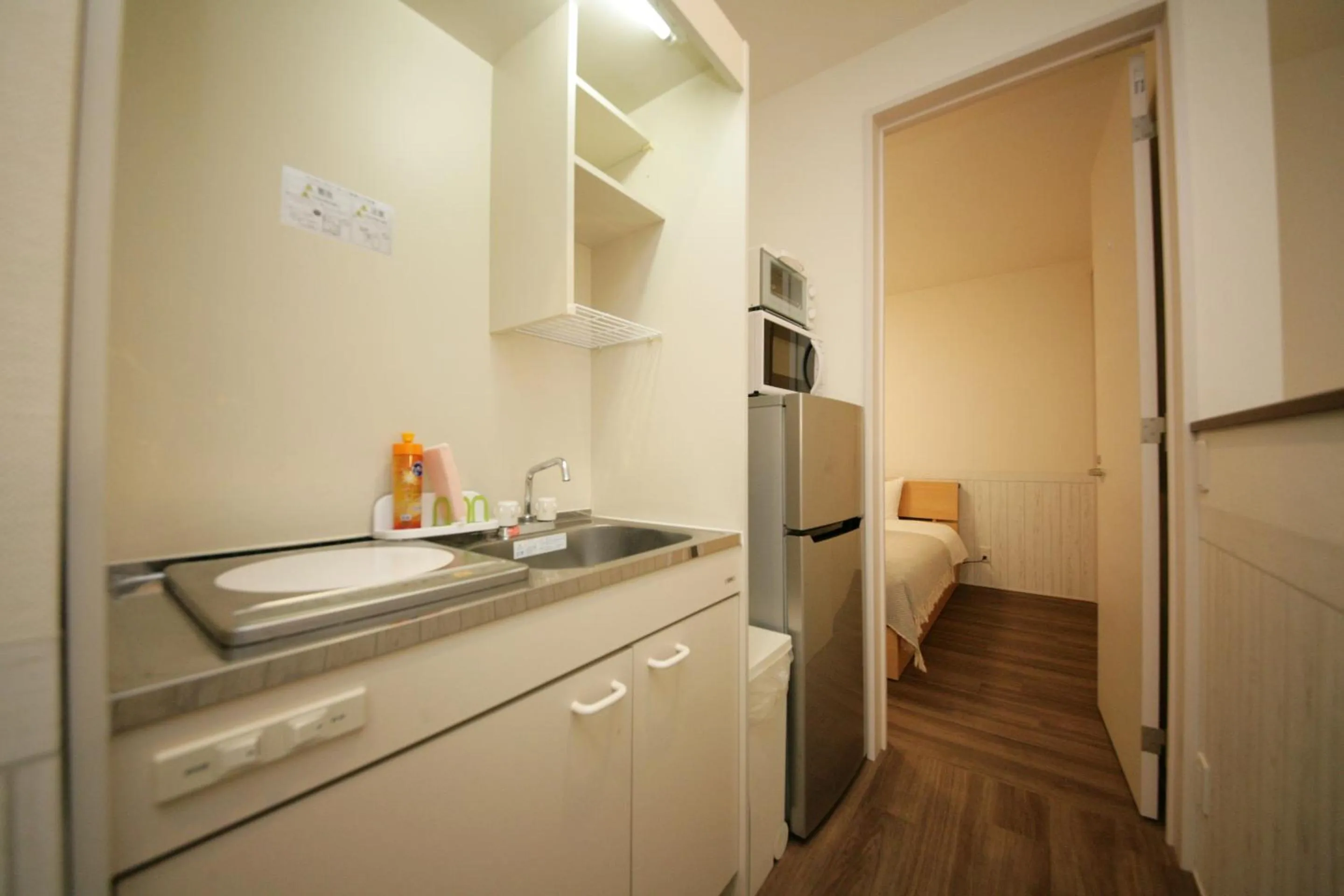 Kitchen or kitchenette in goom Hotel Nakasu R-Tenjin