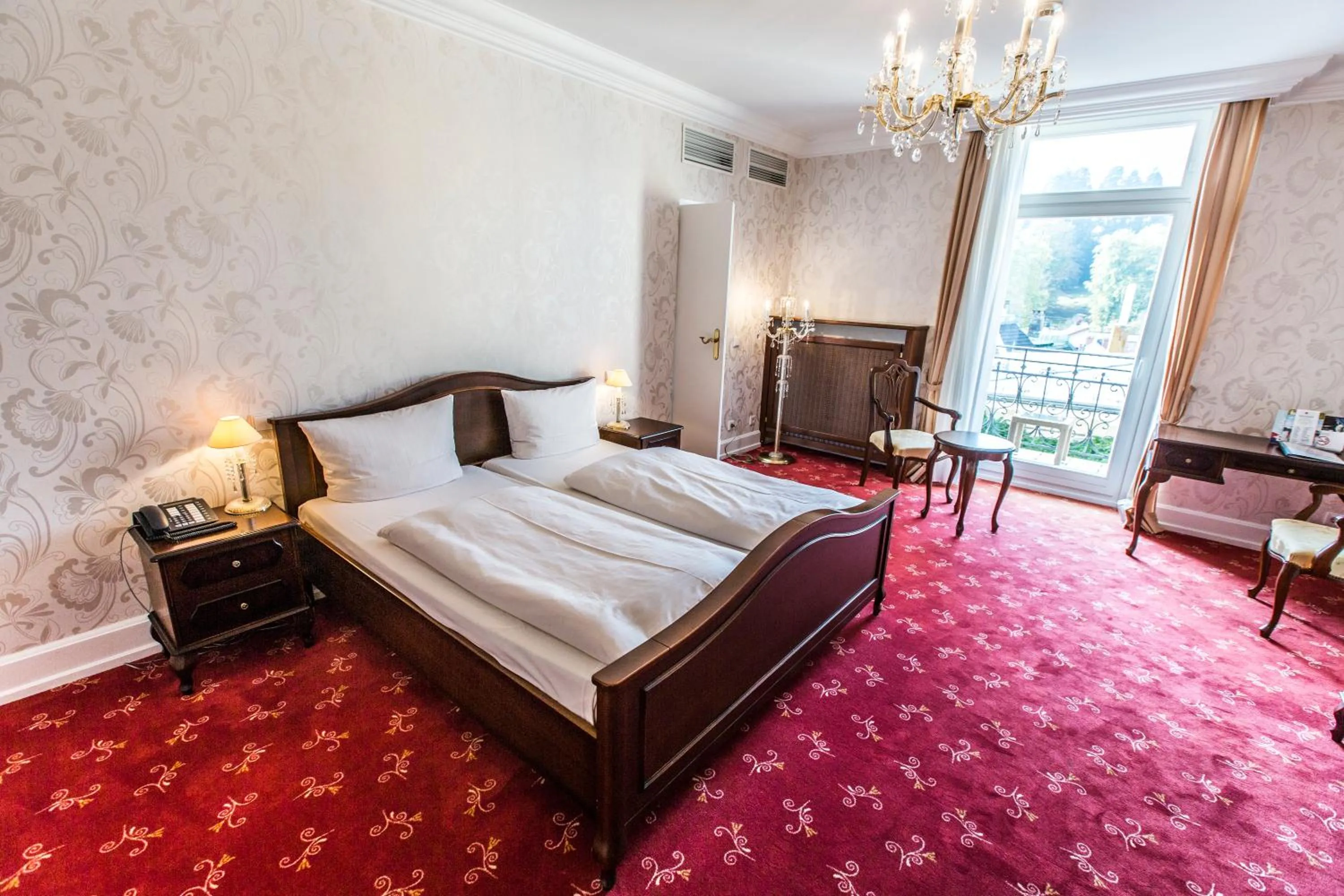 Photo of the whole room, Bed in HELIOPARK Bad Hotel Zum Hirsch