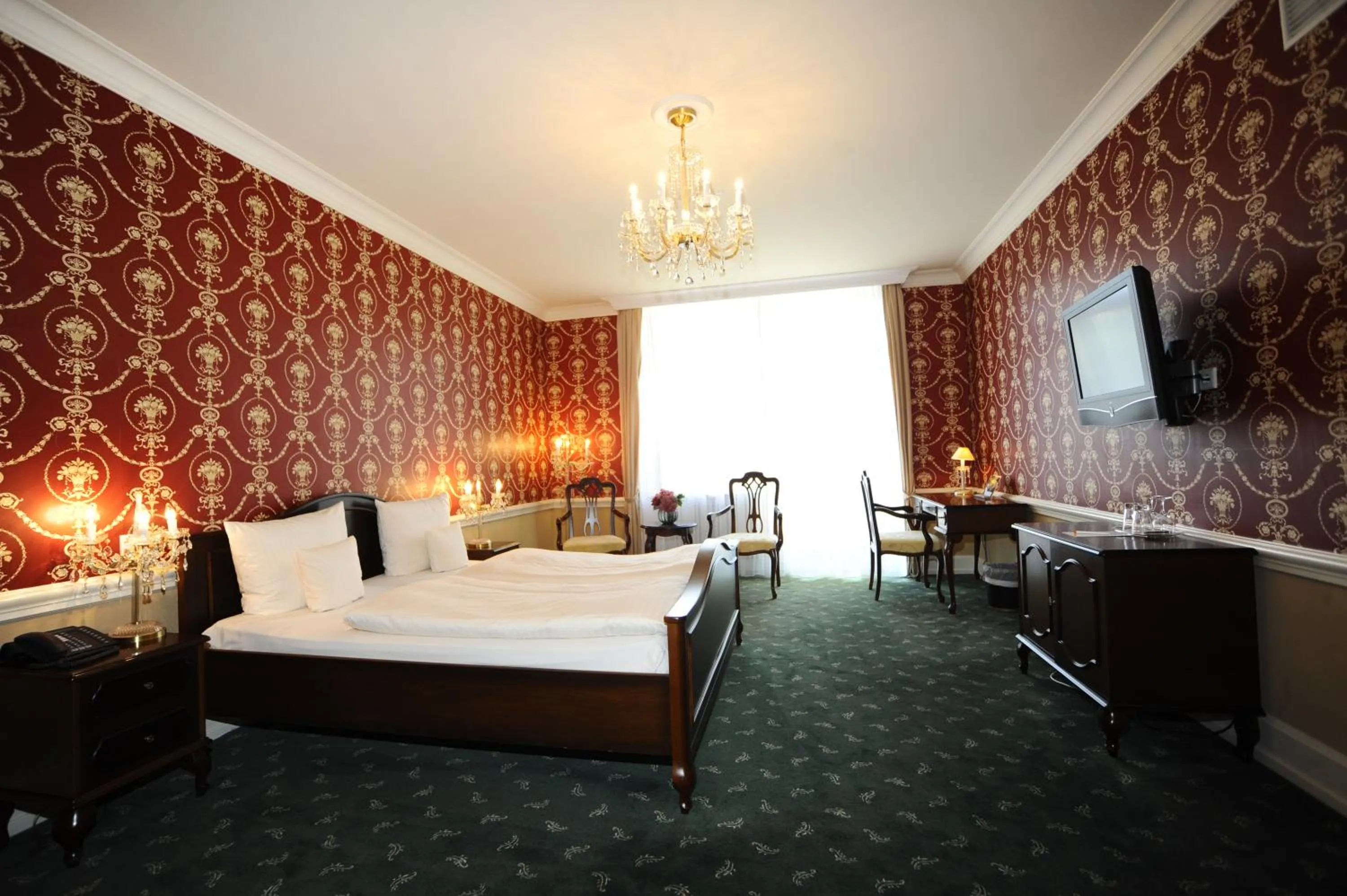 Photo of the whole room, Bed in HELIOPARK Bad Hotel Zum Hirsch