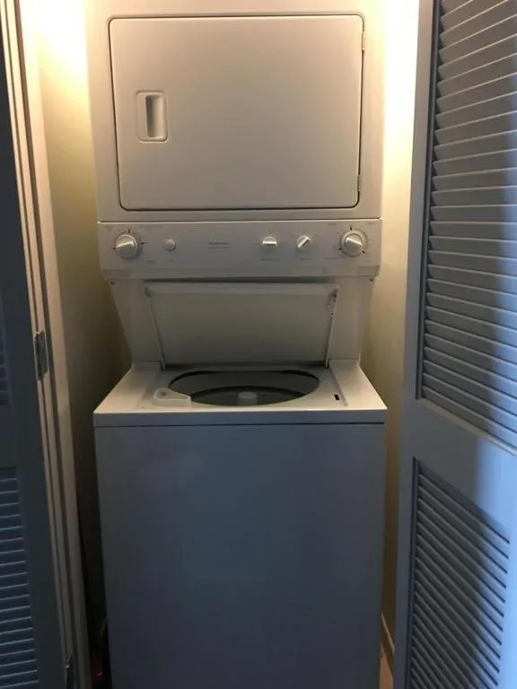 washing machine in Luxury 2 bedroom 2 bathroom Ocean Front Condo on the 12th floor for 8