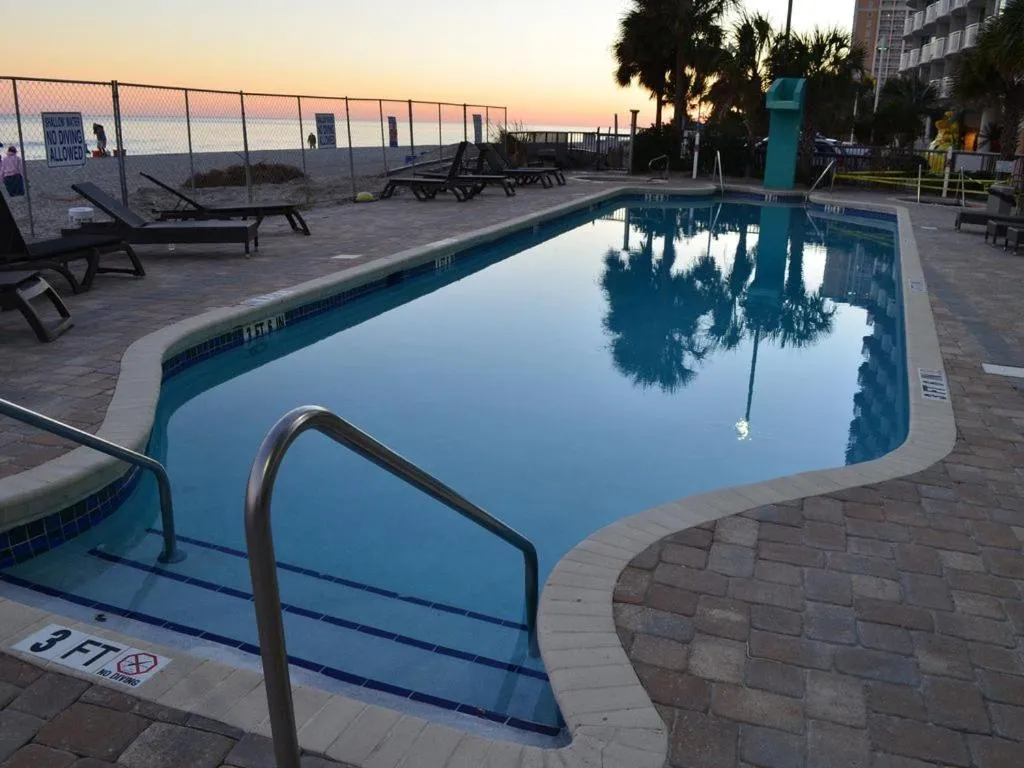 Pool view in Luxury 2 bedroom 2 bathroom Ocean Front Condo on the 12th floor for 8