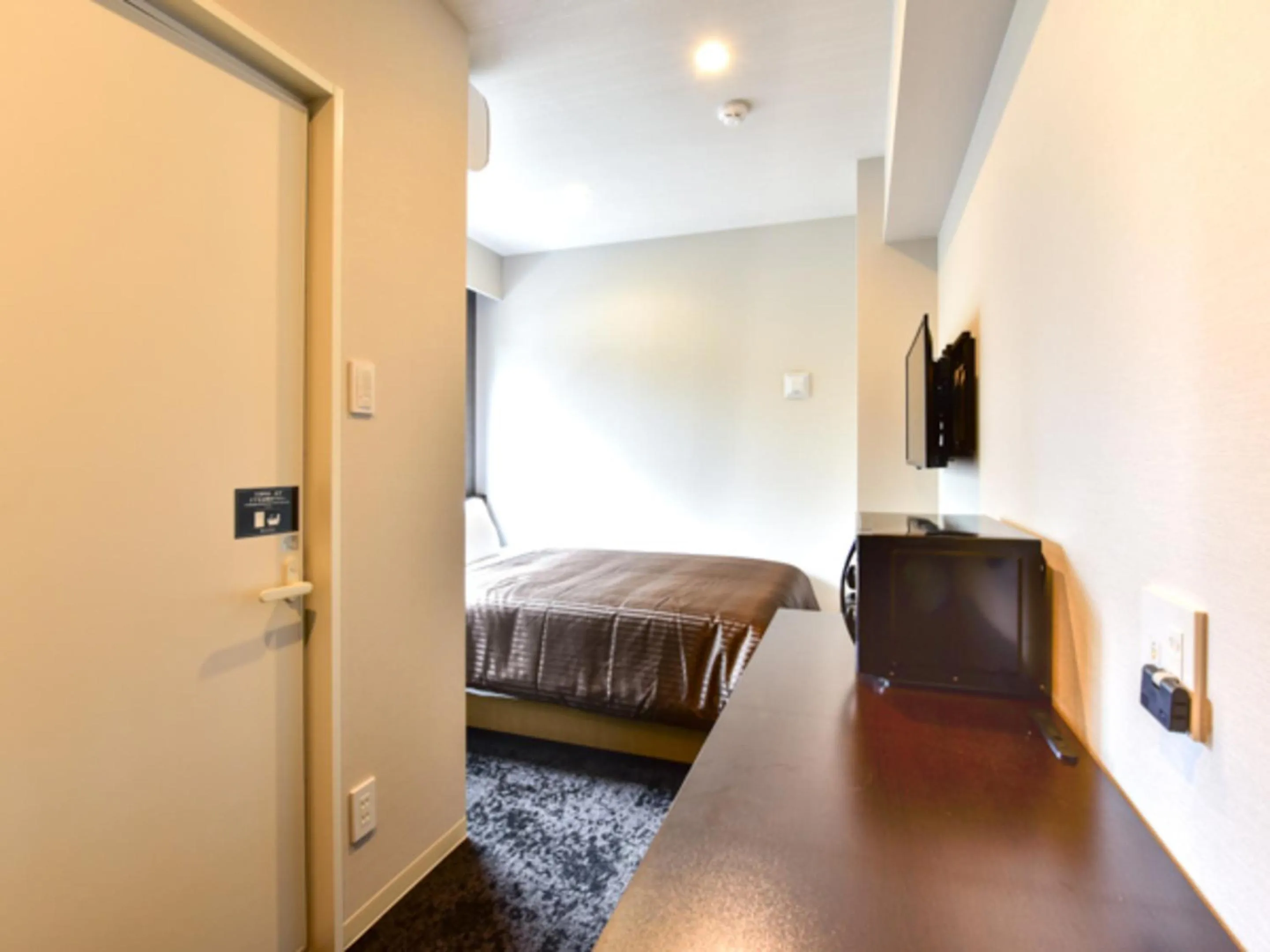 Bed in HOTEL LiVEMAX Fukuoka Tenjin West