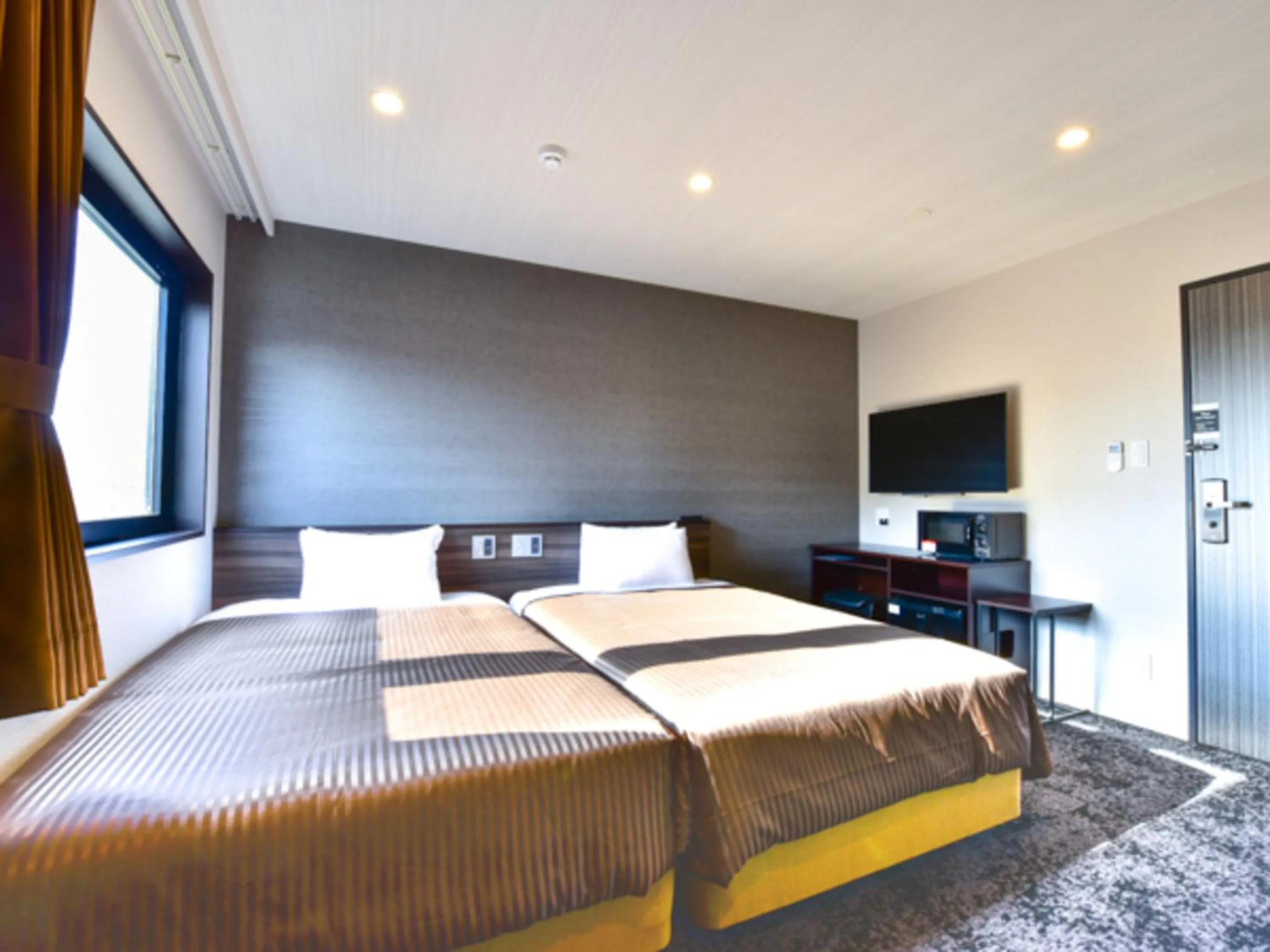 Bed in HOTEL LiVEMAX Fukuoka Tenjin West