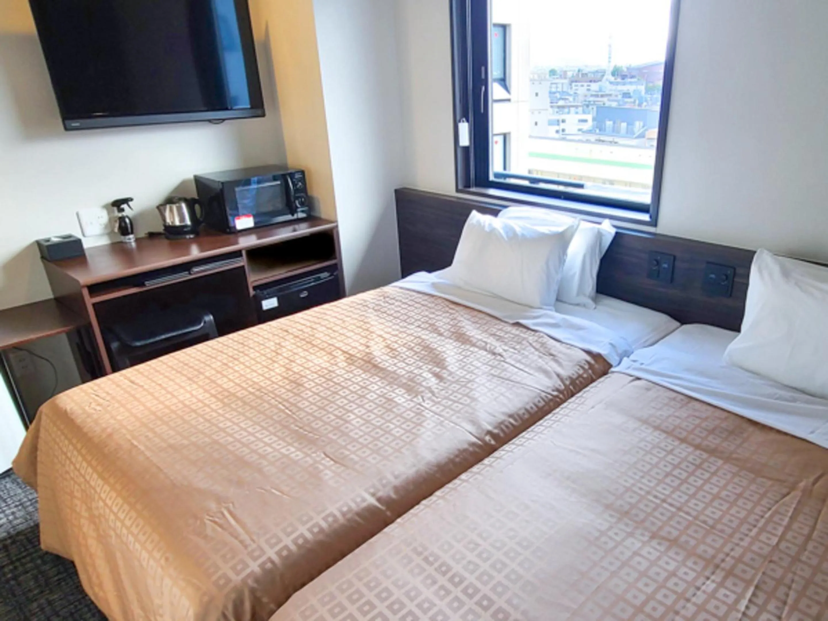 Bed in Hotel Livemax Premium Nagano Ekimae