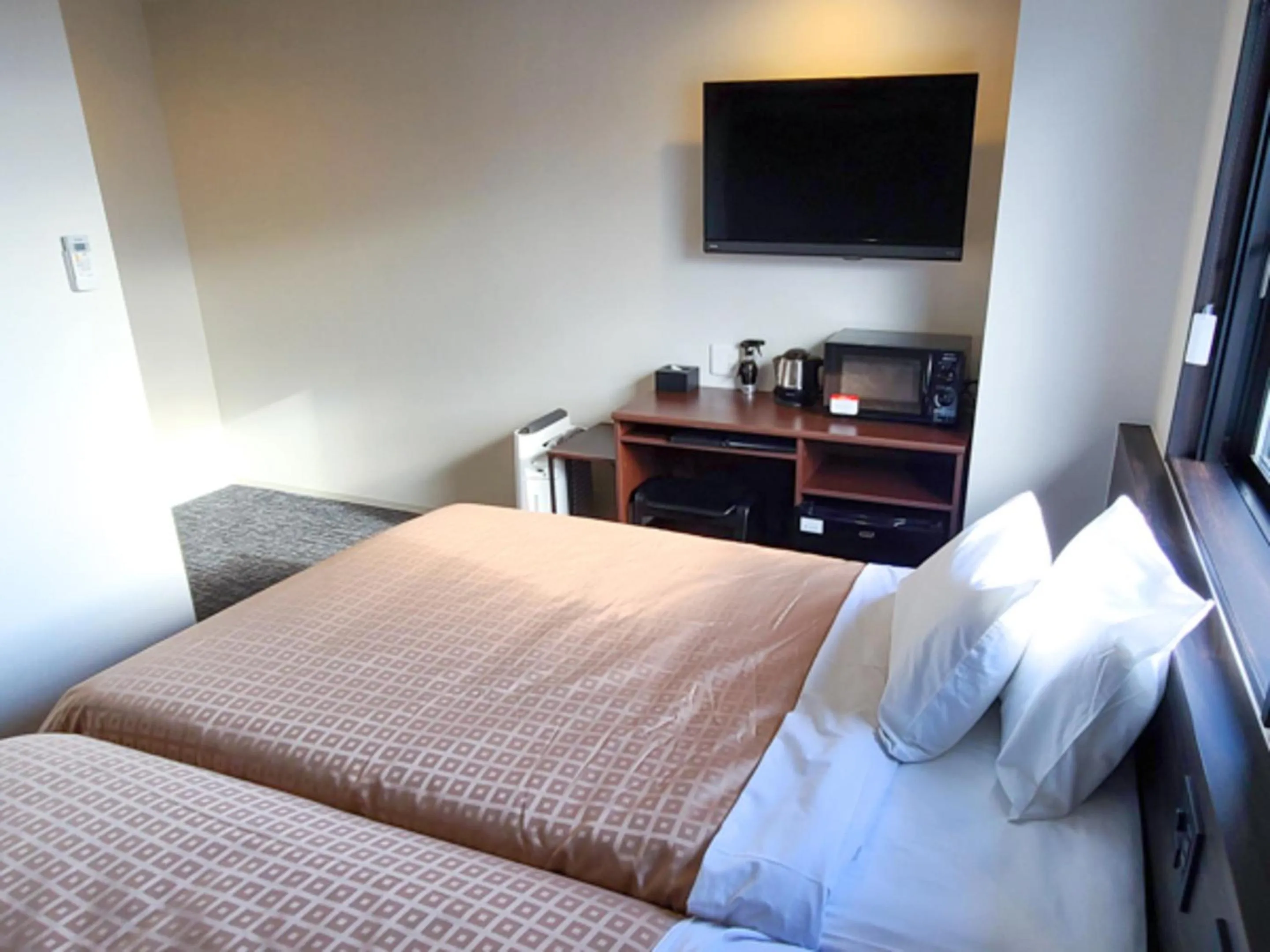 Bed in Hotel Livemax Premium Nagano Ekimae