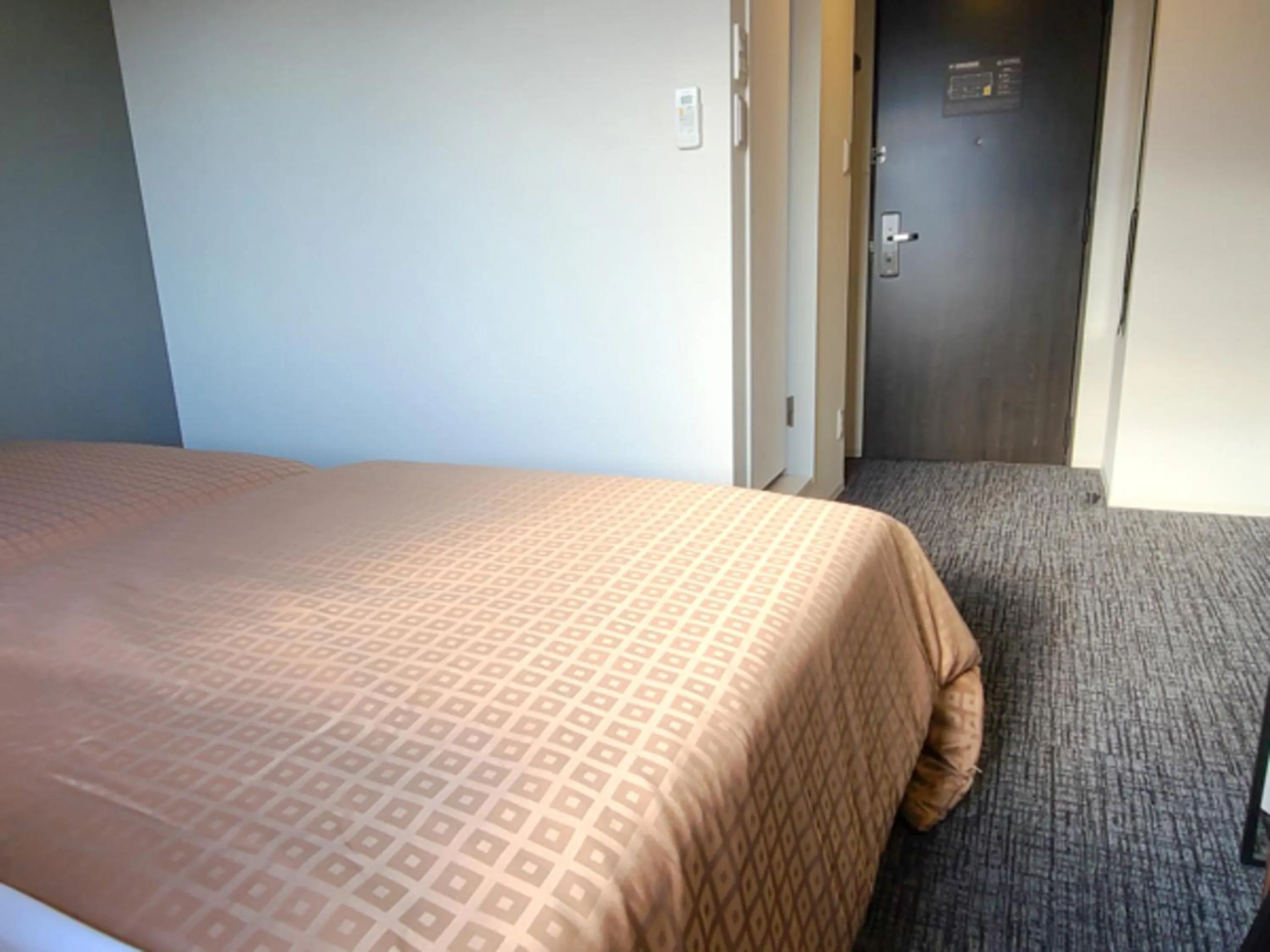 Bed in Hotel Livemax Premium Nagano Ekimae