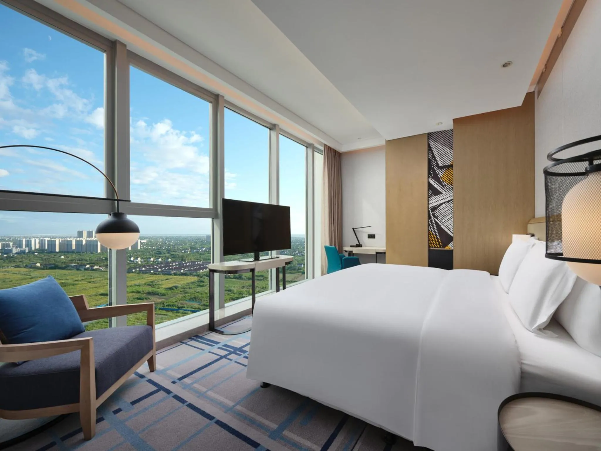 Photo of the whole room, Bed in Crowne Plaza Qidong by IHG