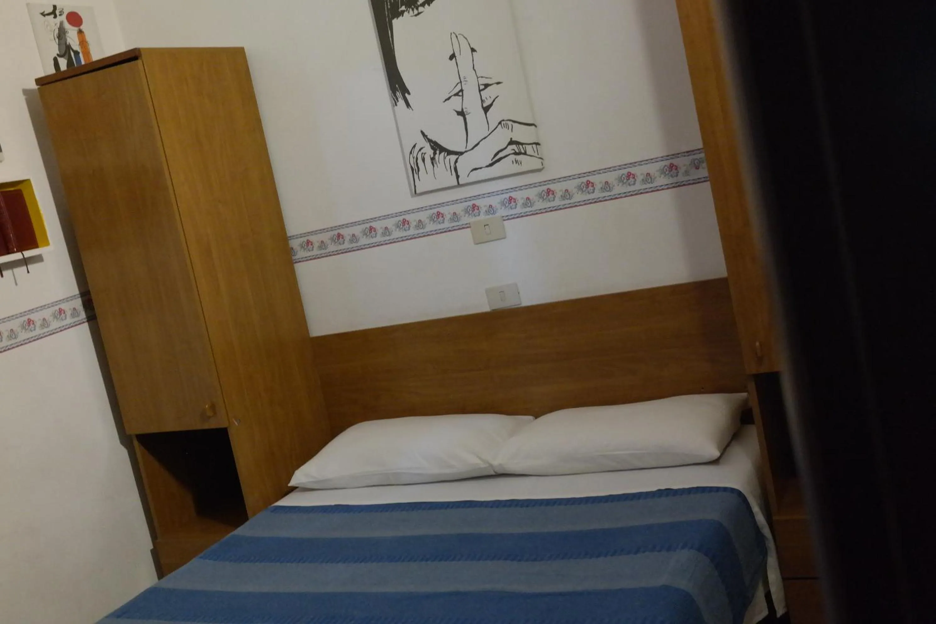 Photo of the whole room, Bed in Hotel Houston Livorno - Struttura Esclusivamente Turistica - Not for Business or Workers