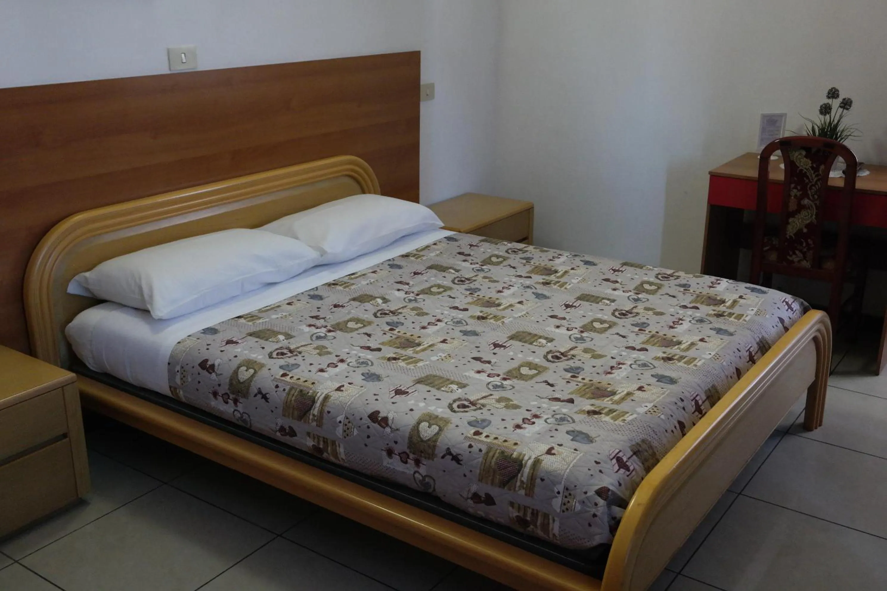 Photo of the whole room, Bed in Hotel Houston Livorno - Struttura Esclusivamente Turistica - Not for Business or Workers