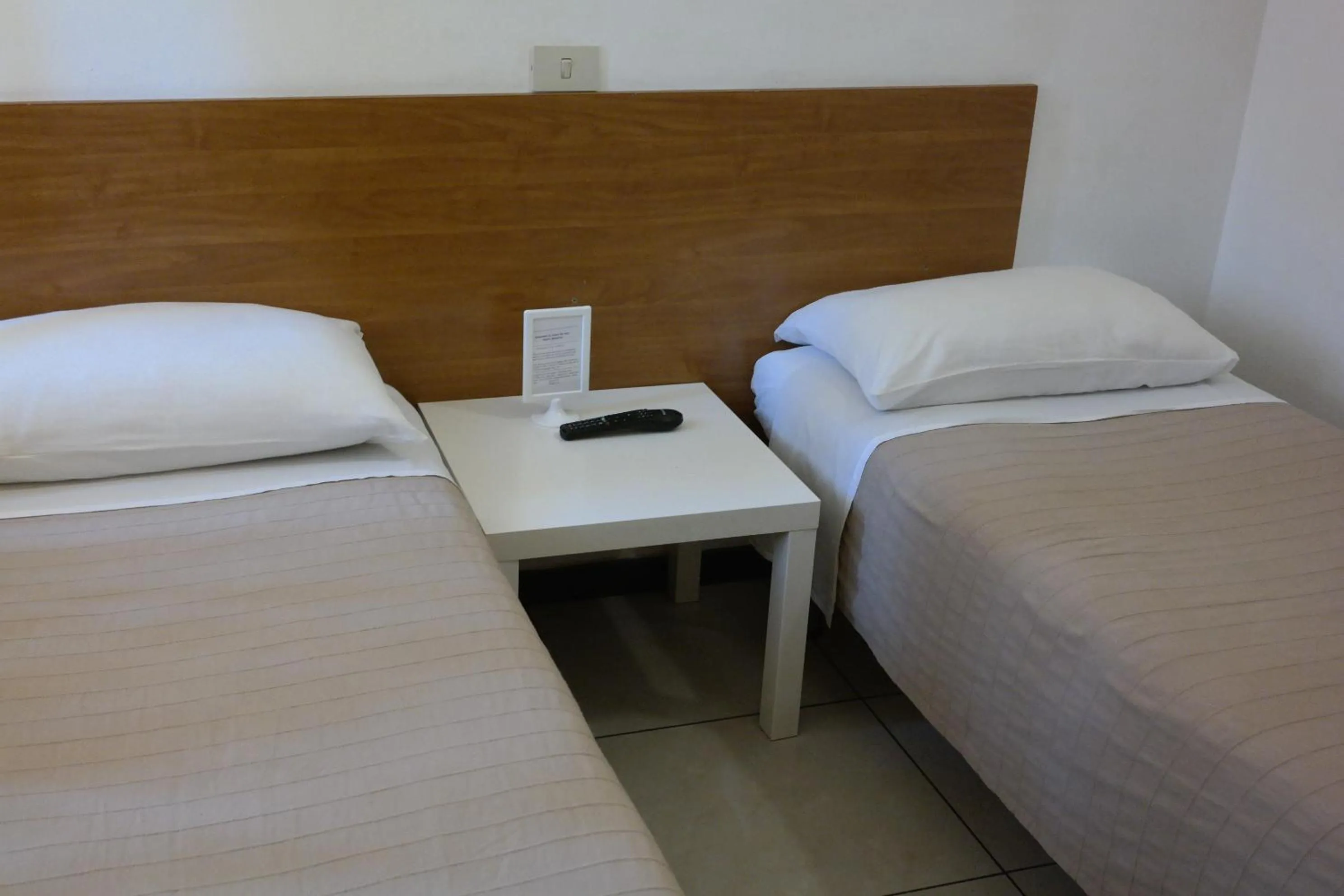Photo of the whole room, Bed in Hotel Houston Livorno - Struttura Esclusivamente Turistica - Not for Business or Workers