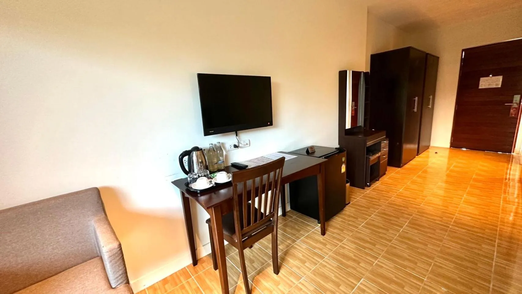 Seating area in Chainarai Riverside - SHA Plus Certified