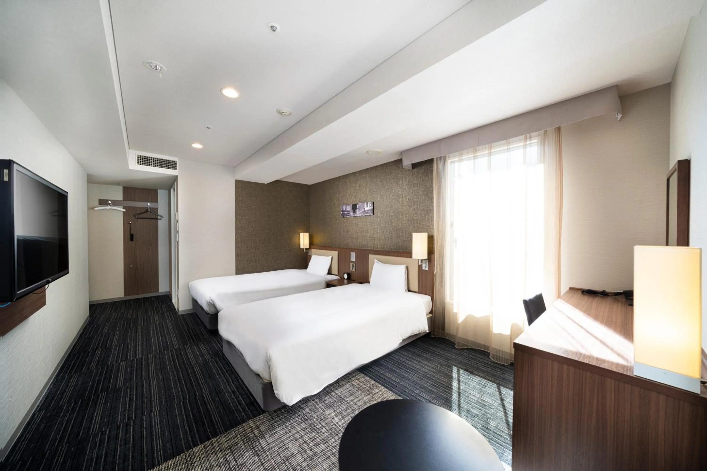 Photo of the whole room, Bed in KOKO HOTEL Ginza-1chome