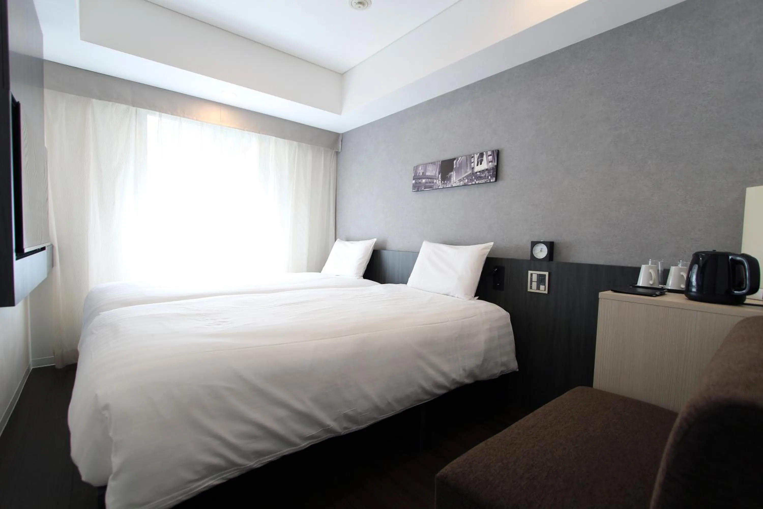 Photo of the whole room, Bed in KOKO HOTEL Ginza-1chome