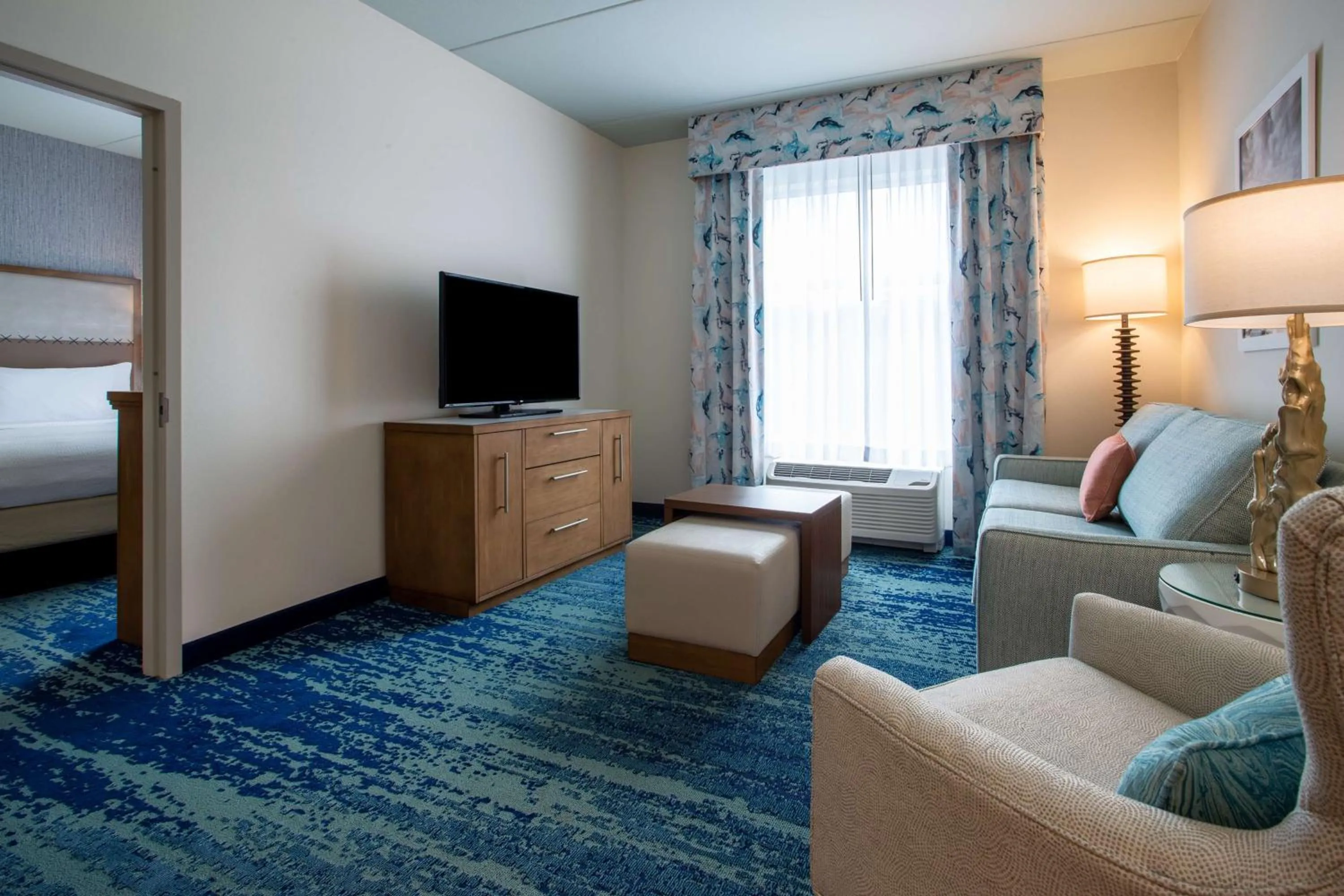 Living room, Bed in Homewood Suites By Hilton Myrtle Beach Coastal Grand Mall