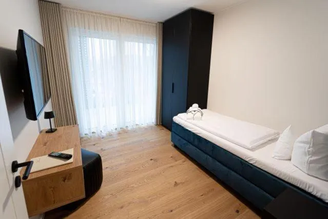 Bed in See und Sporthotel Ankum mit Lakeside Apartments