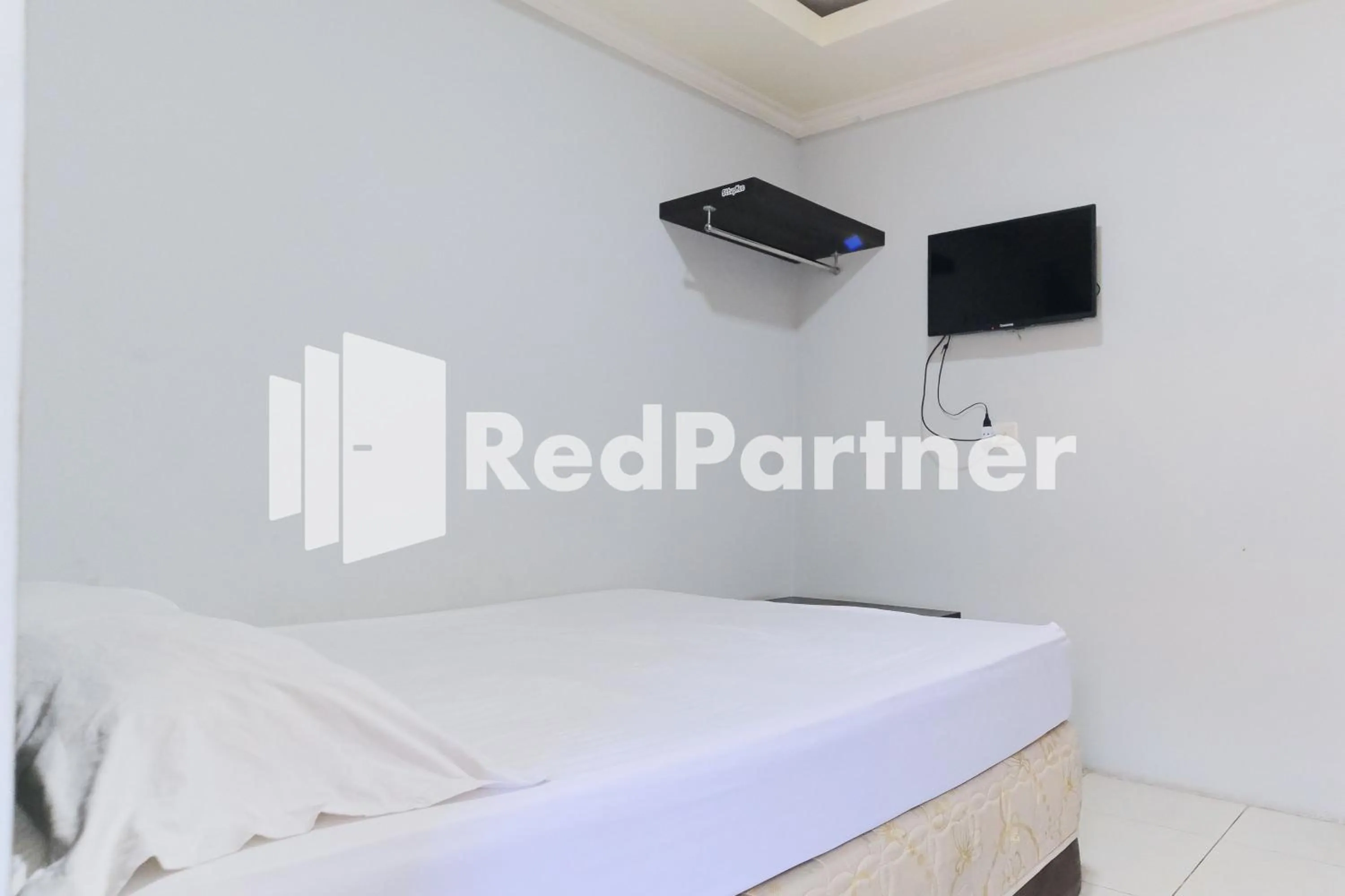 Bedroom, Bed in Dea Homestay Syariah at Kertomenanggal Surabaya Mitra RedDoorz