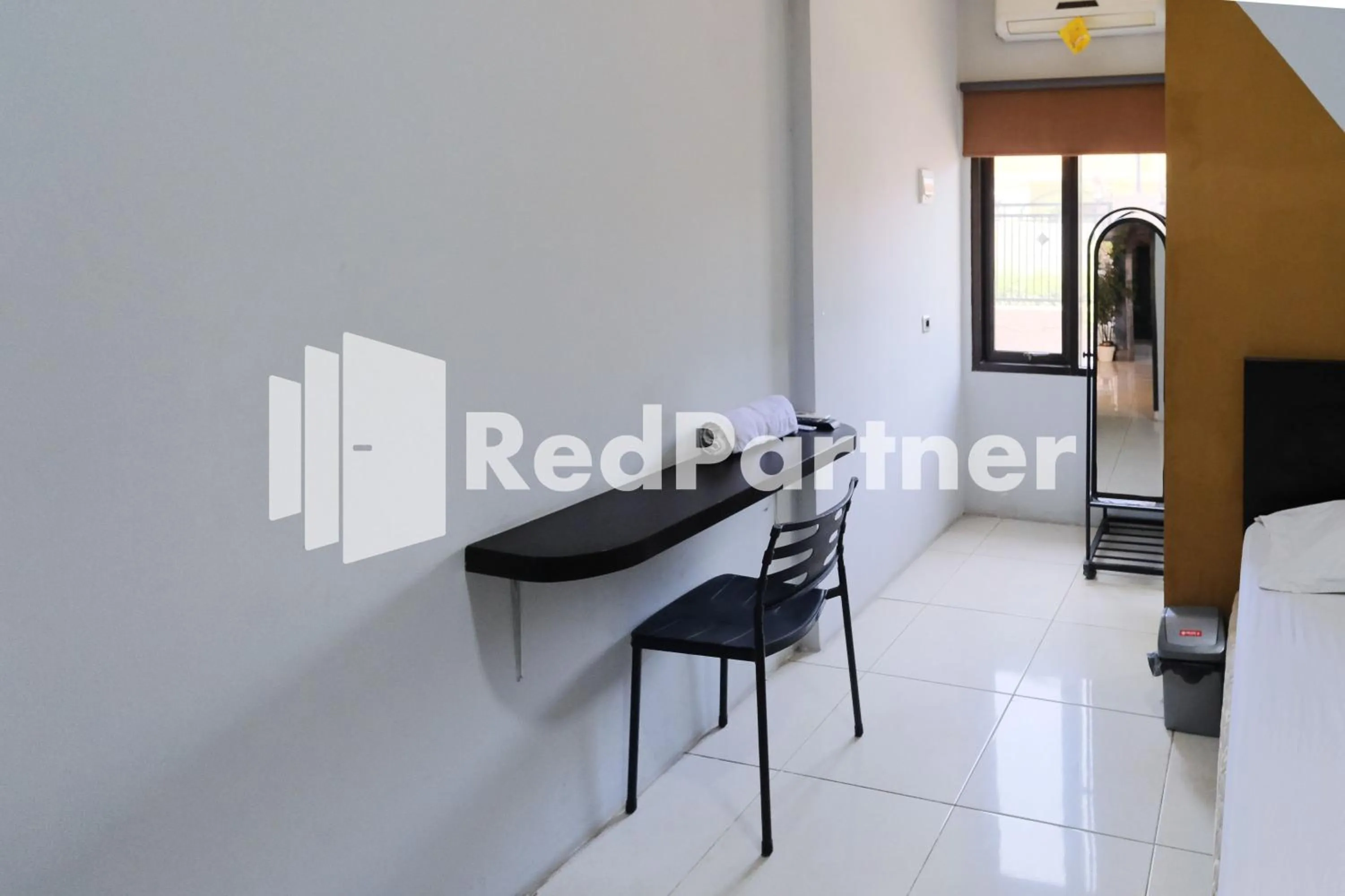 Bedroom in Dea Homestay Syariah at Kertomenanggal Surabaya Mitra RedDoorz