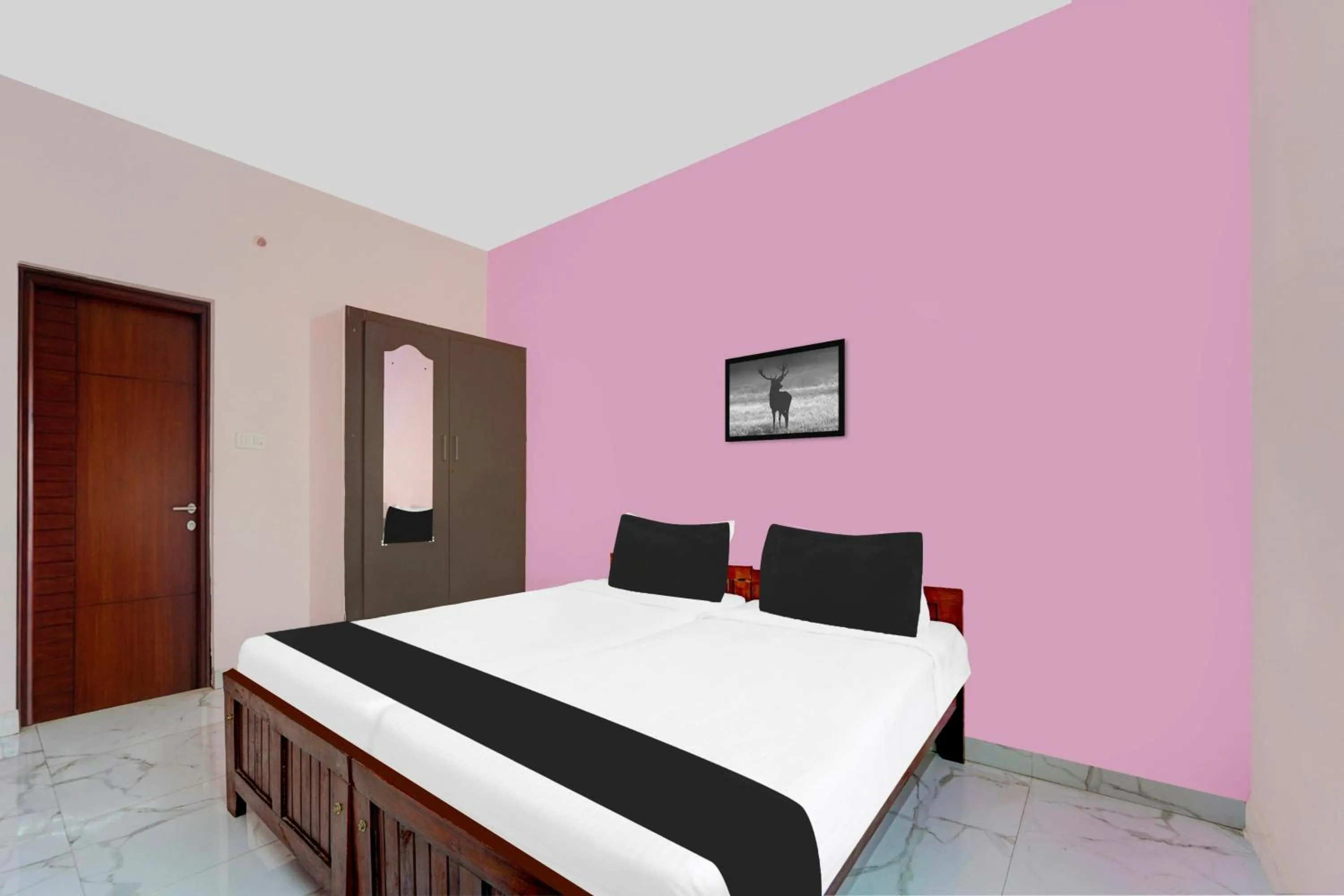 Bedroom in Super Hotel O Madurai Near Bus Stand