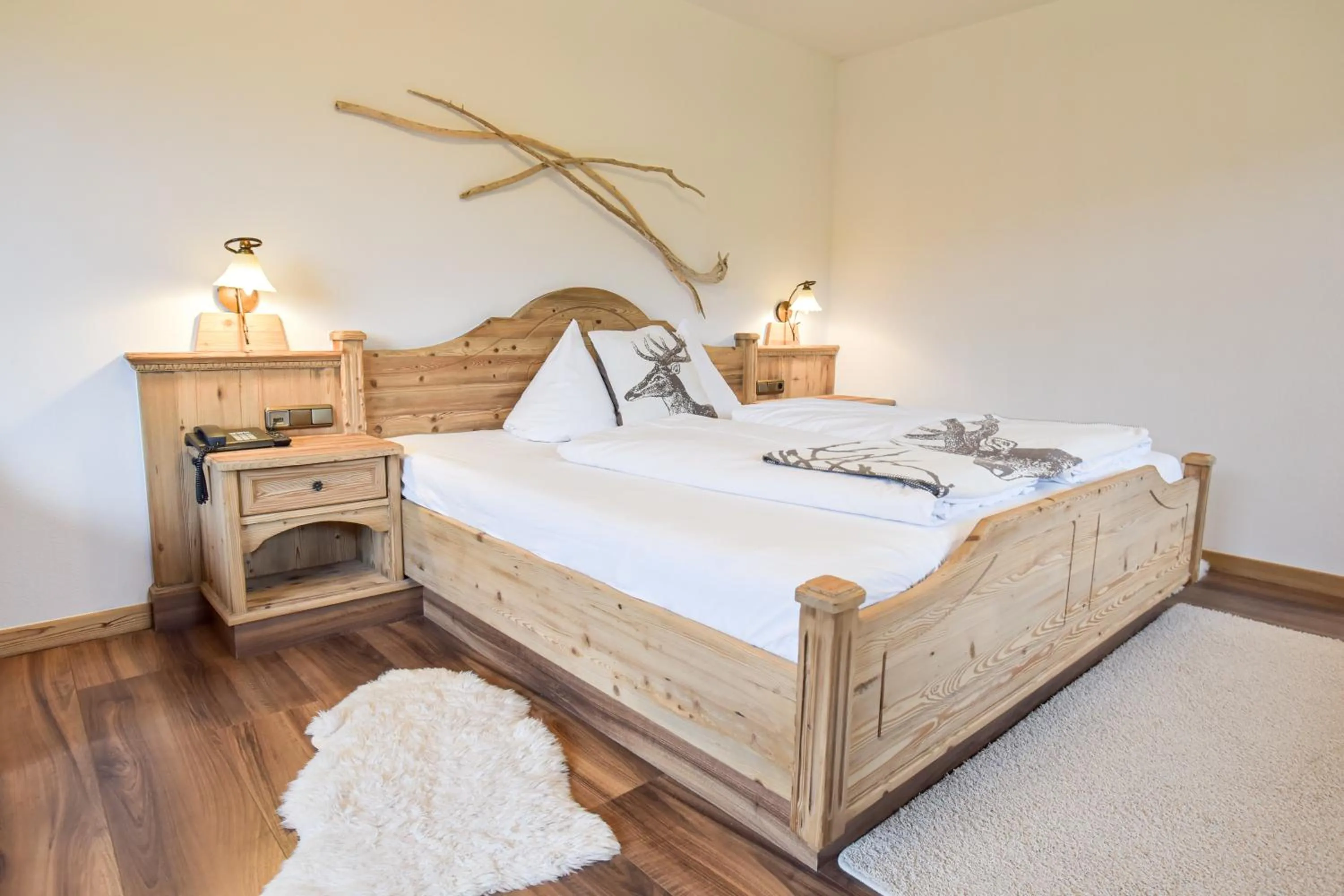 Bed in Feuriger Tatzlwurm Berghotel & Spa, BW Signature Collection