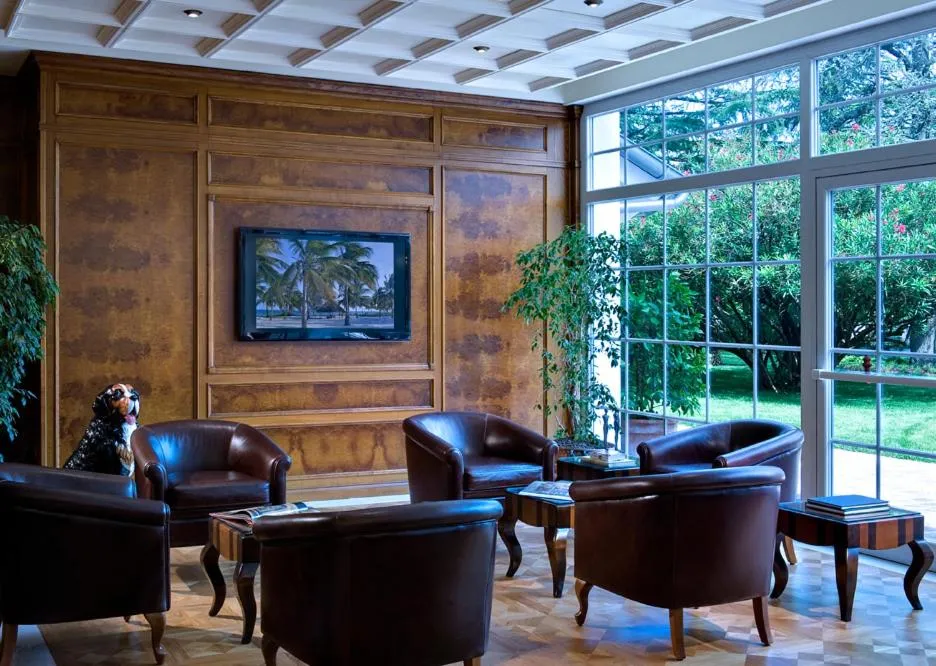 Communal lounge/ TV room in Tritone LUXURY HOTEL THERMAE & SPA