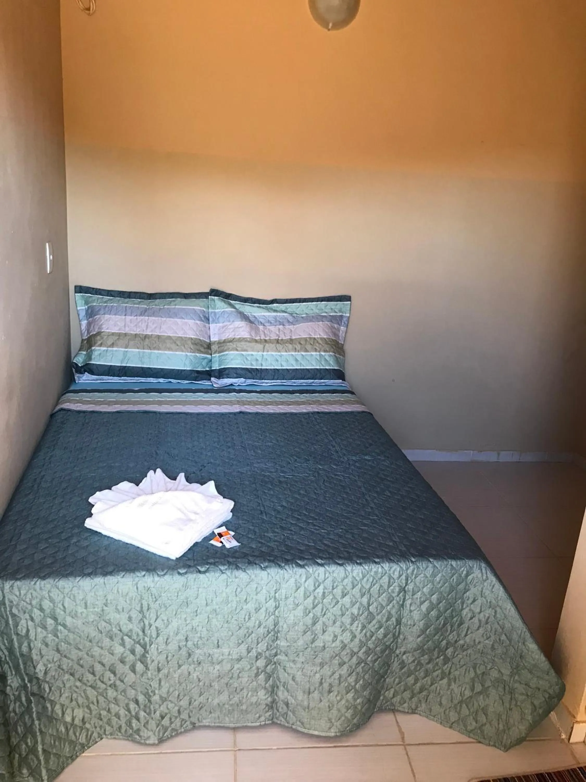 Bed in Pousada Floripes