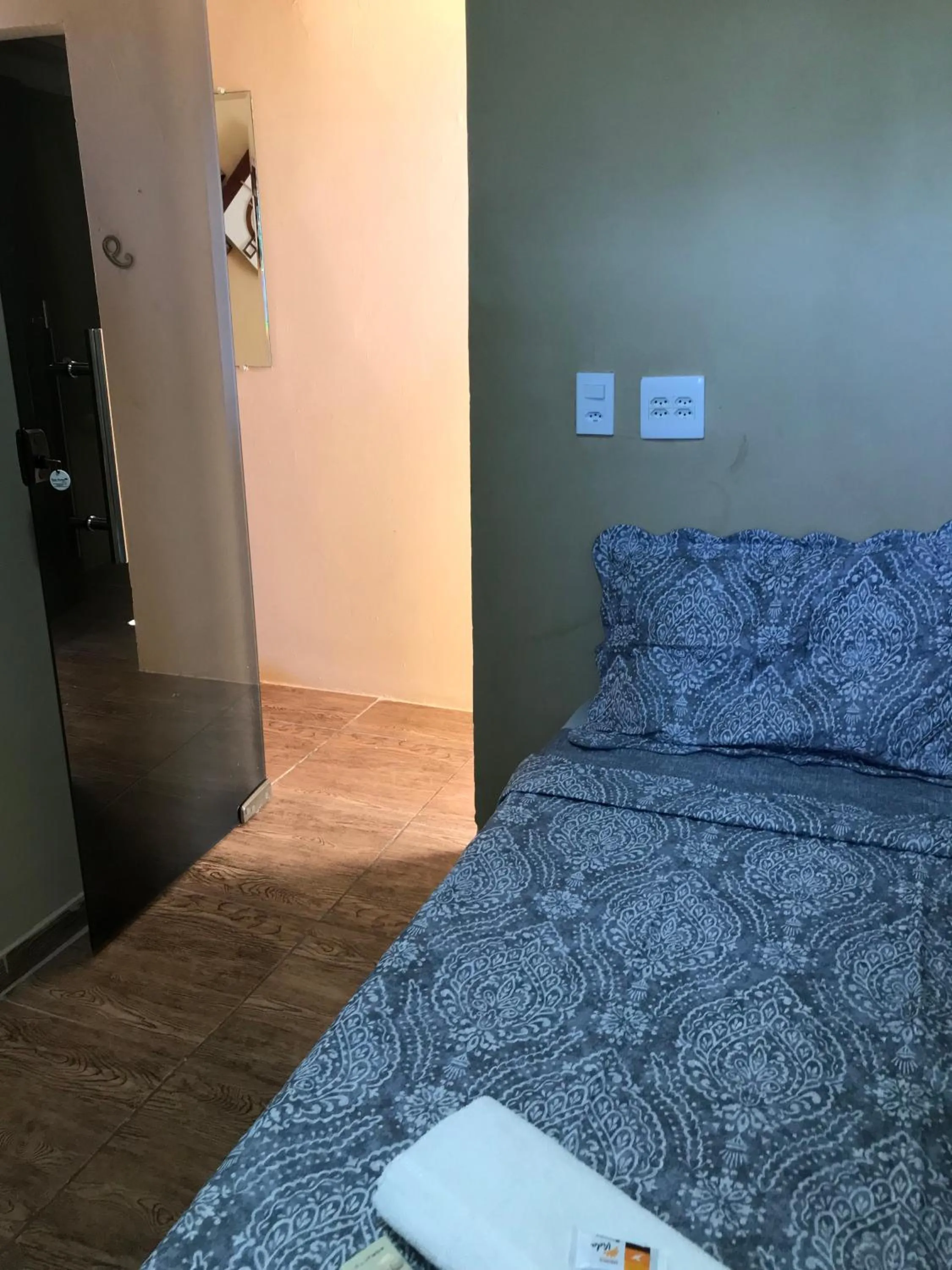 Bed in Pousada Floripes