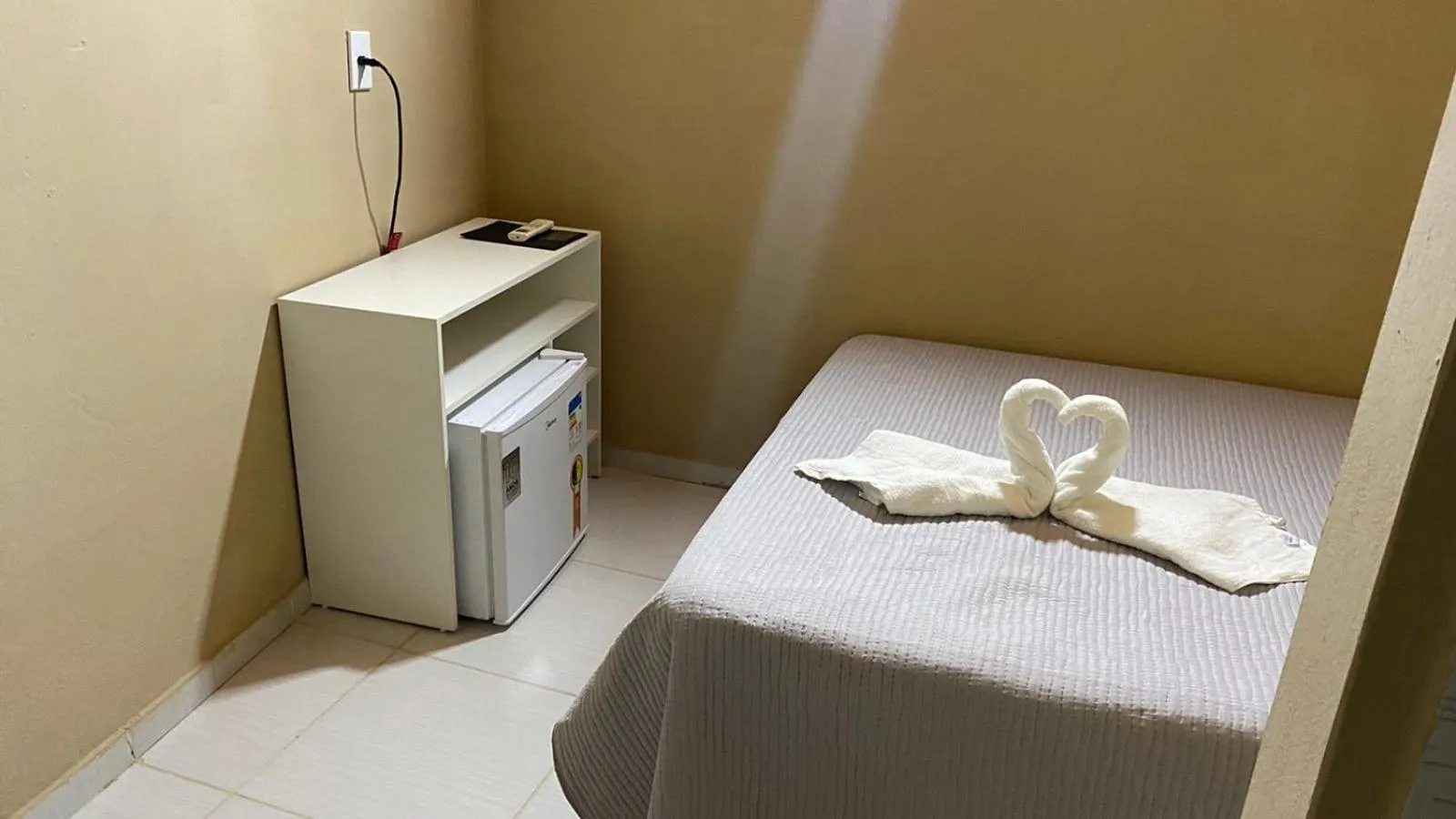 Bed in Pousada Floripes