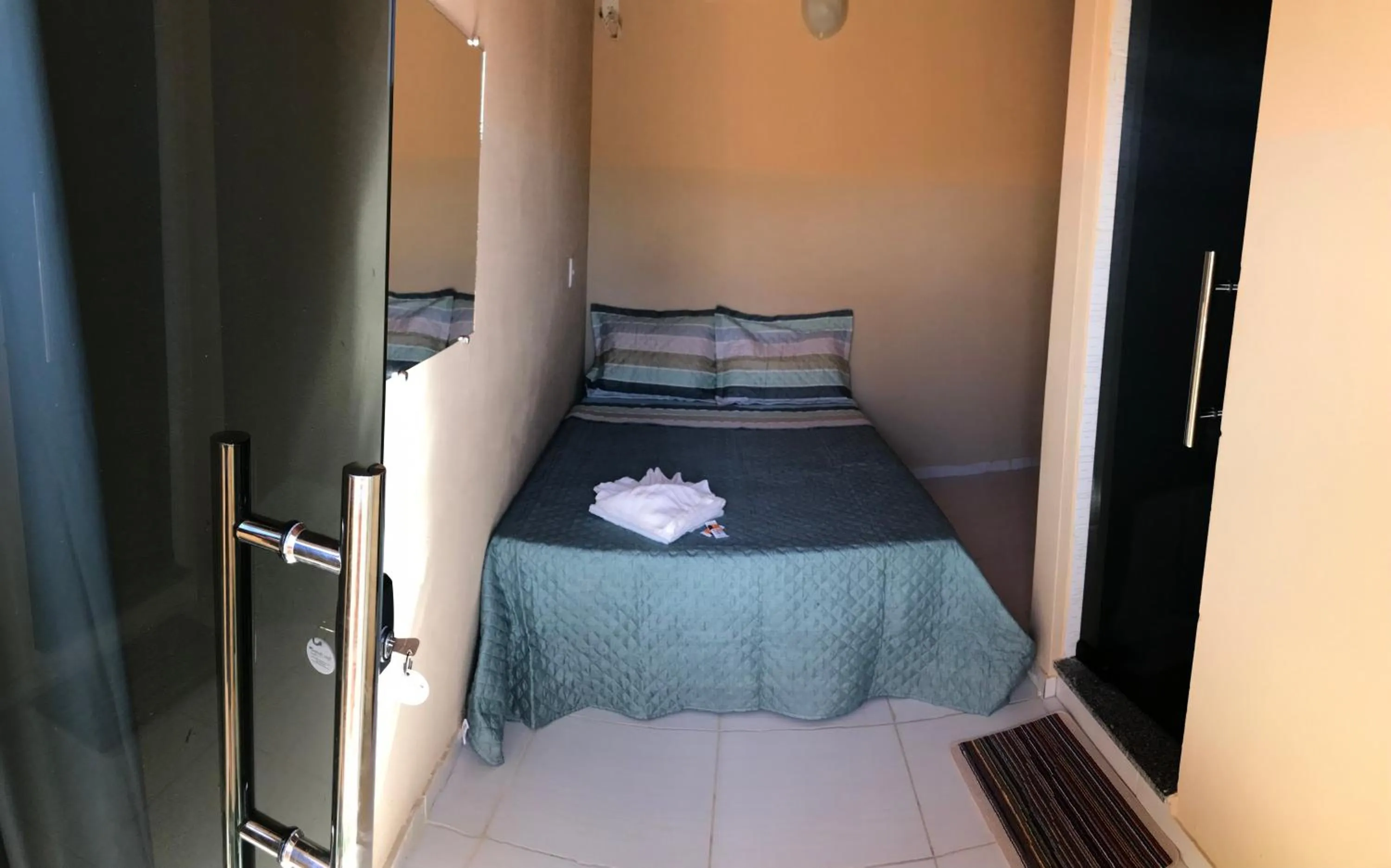 Bed in Pousada Floripes