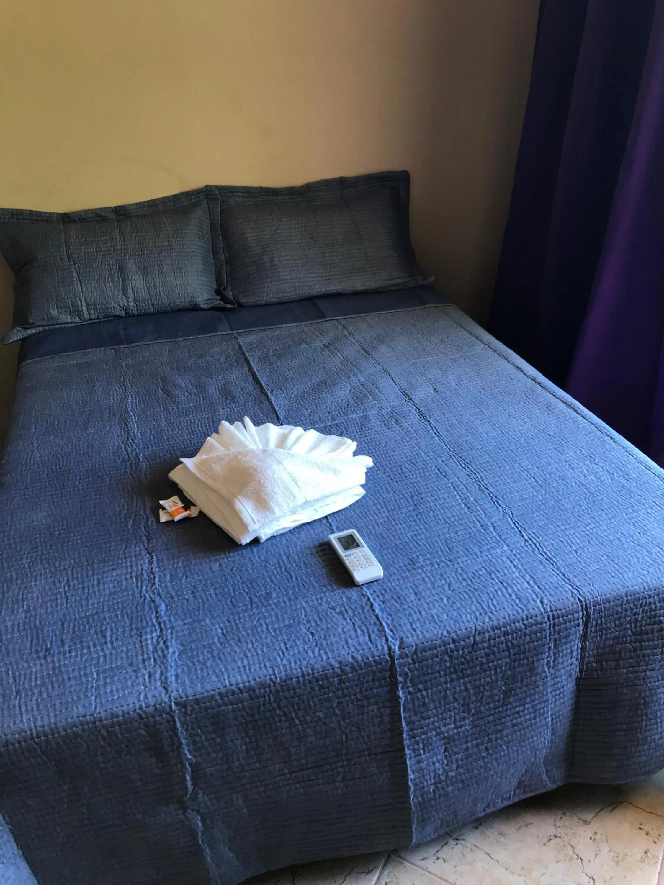 Bed in Pousada Floripes