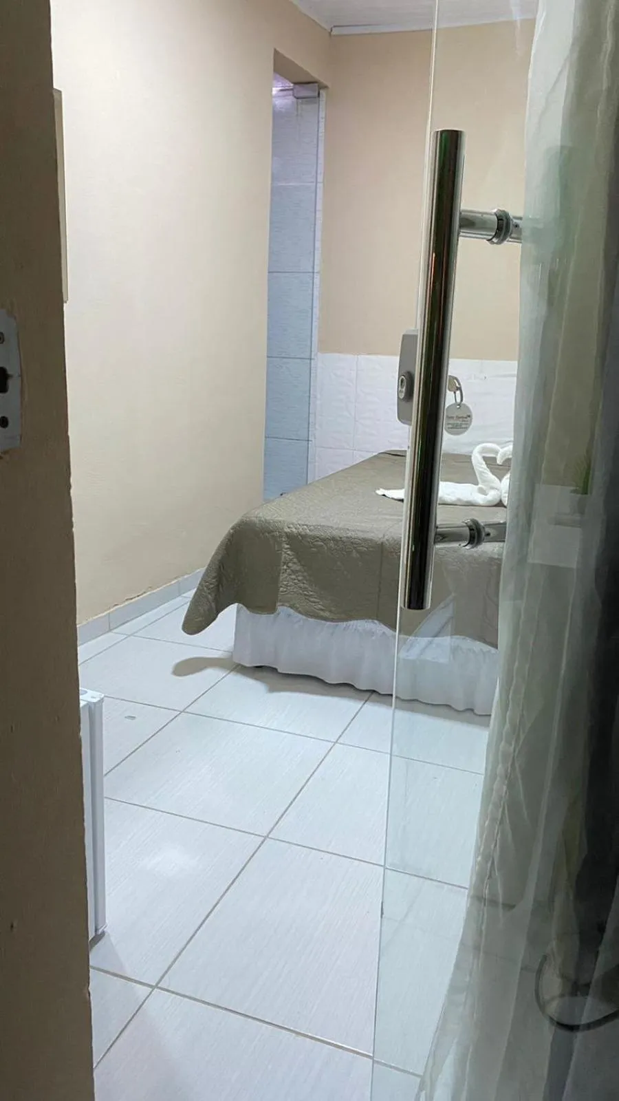 Bed in Pousada Floripes