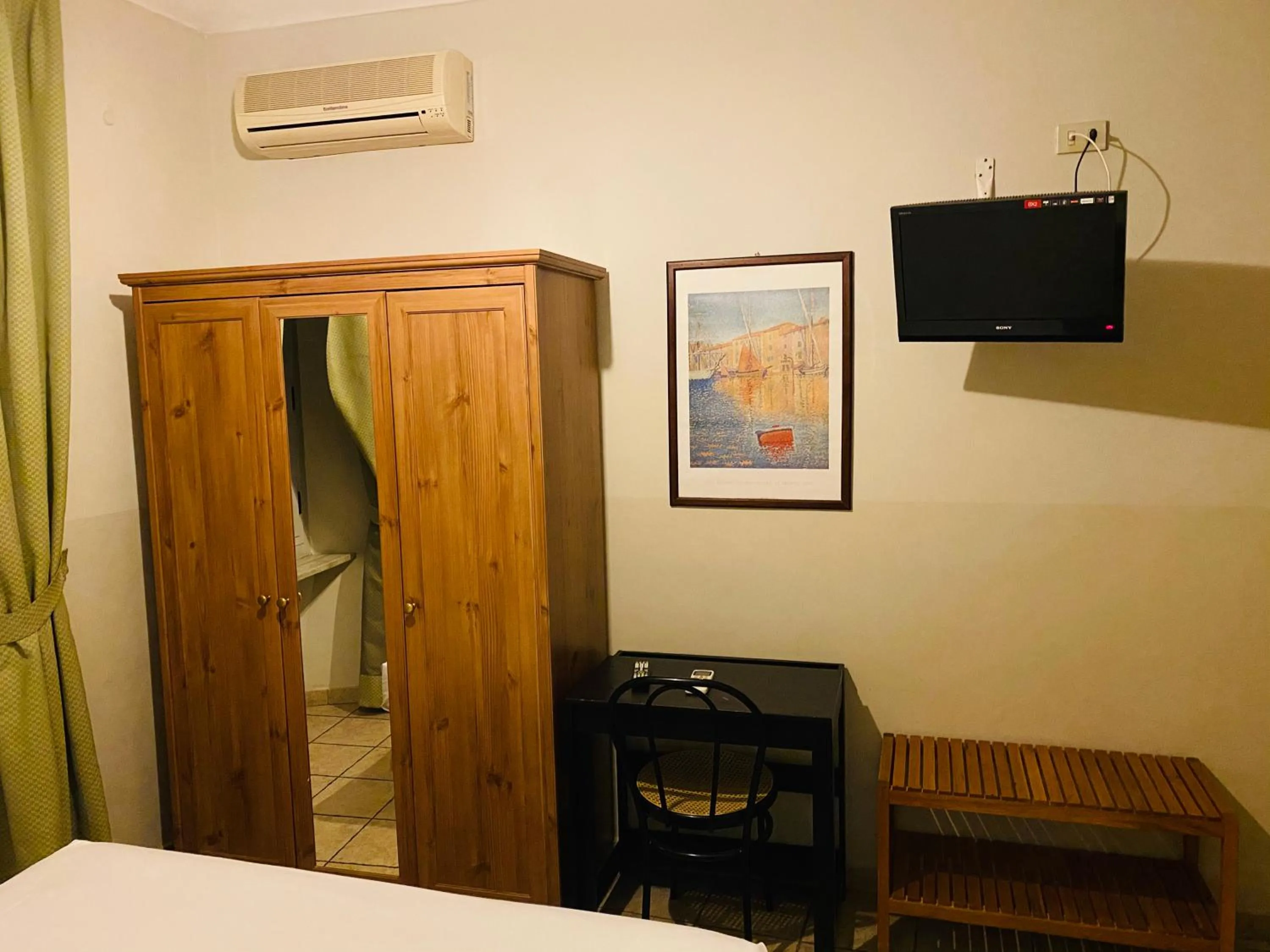 Bed in Hotel Ferrucci