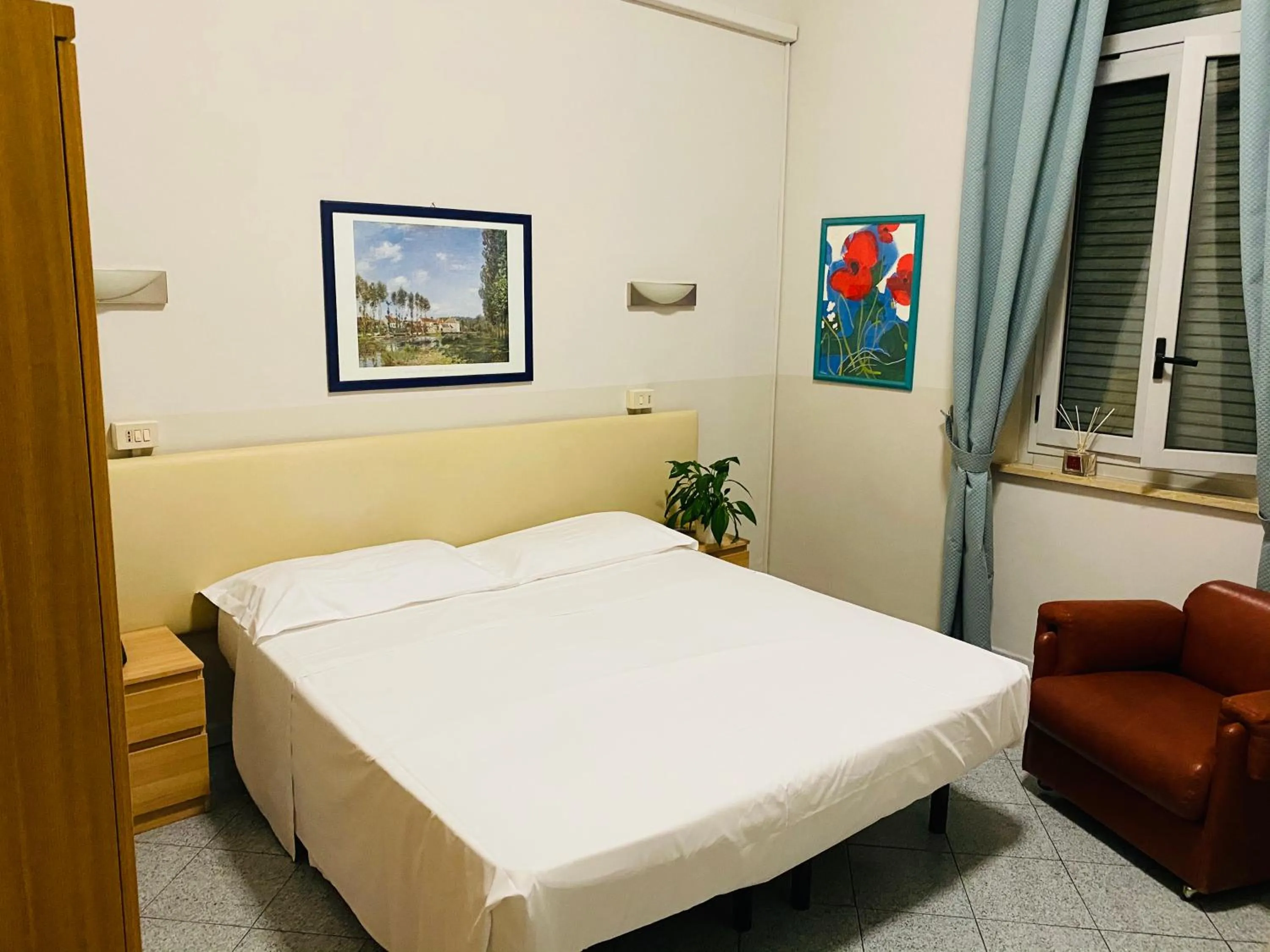 Bed in Hotel Ferrucci