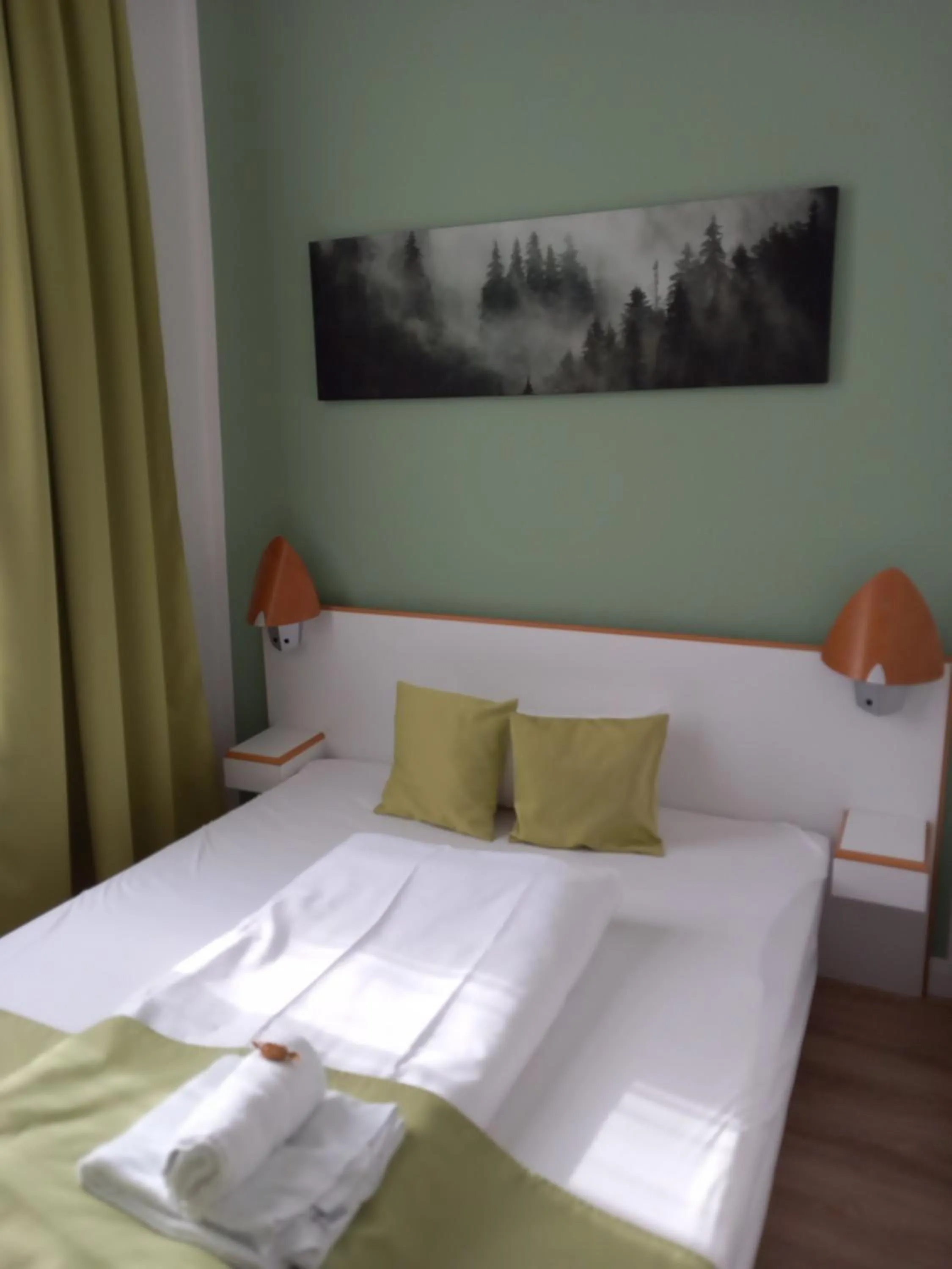 Bedroom, Bed in Hotel Karolinger - Self Check-In