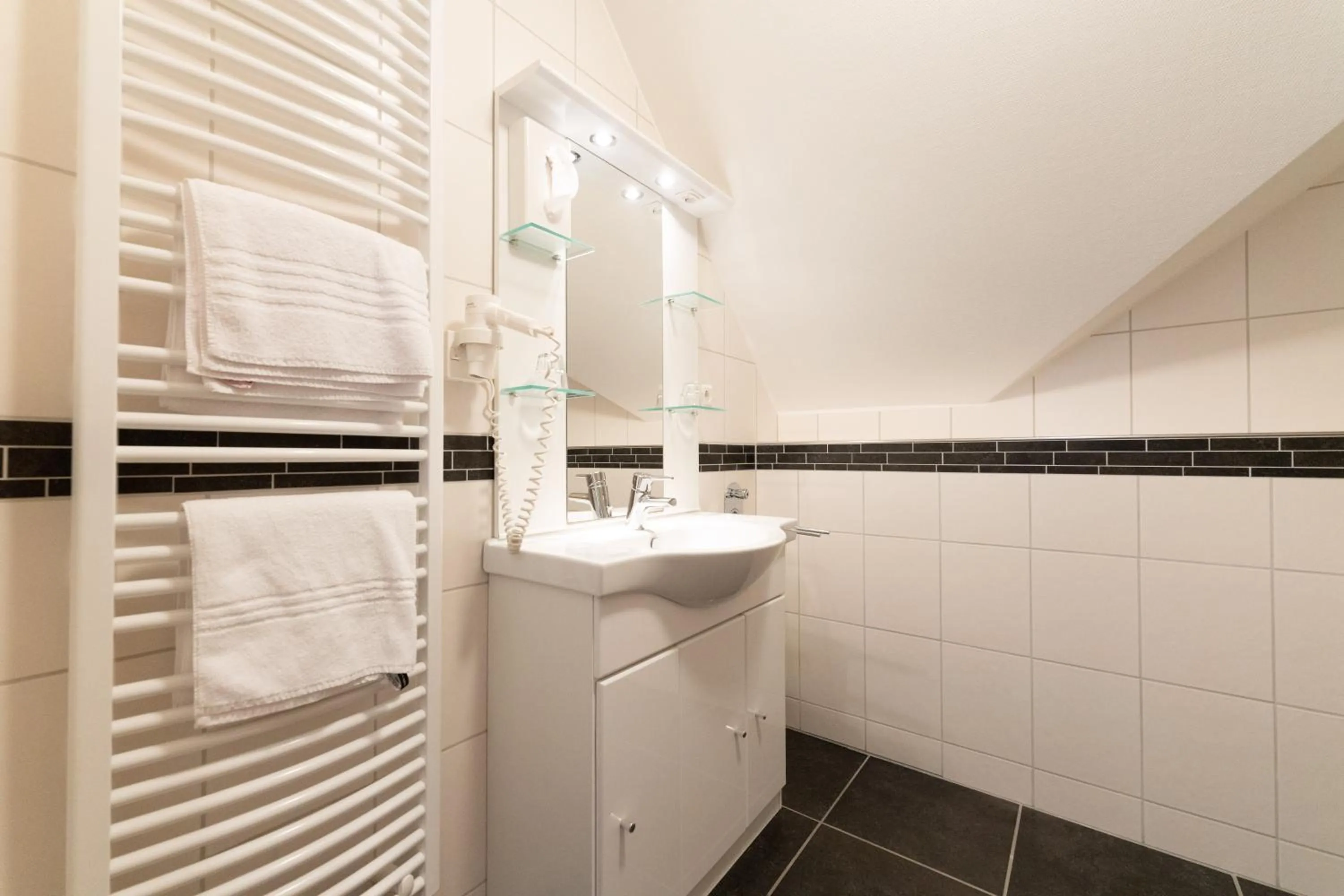 Bathroom in BurgStadt-Hotel