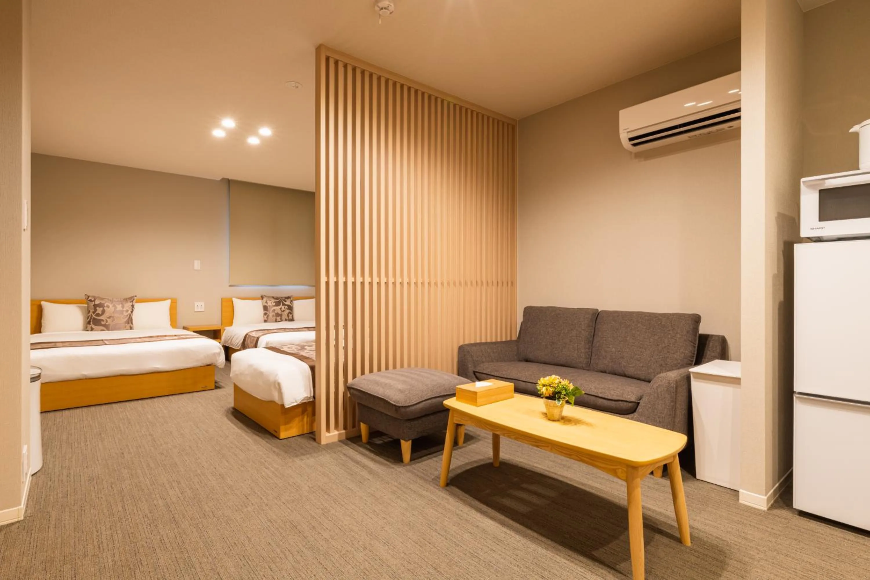 Living room, Bed in GRAND BASE Nagasaki Chukagai